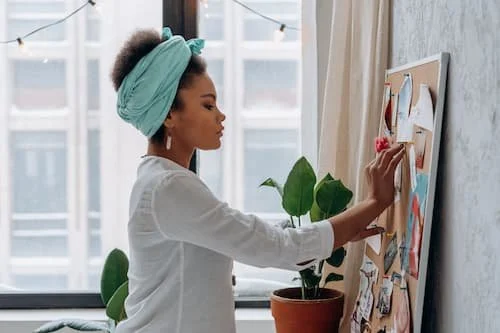 Woman concentrating on creating her vision for her future, setting the stage
