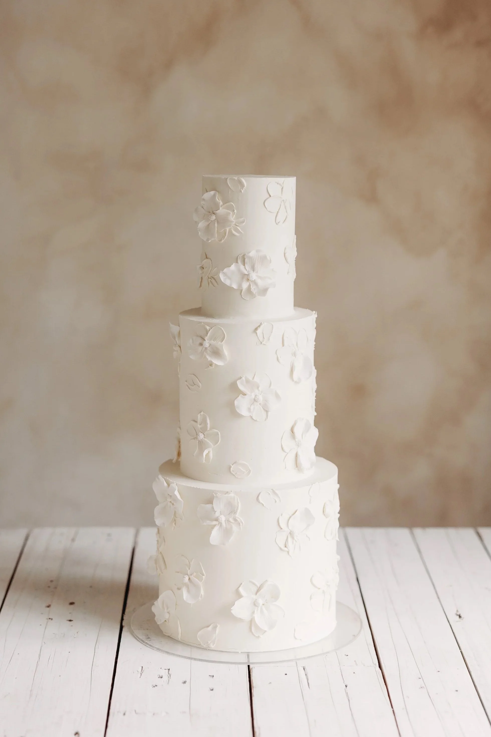 White Cambridge Wedding Cake with painted florals