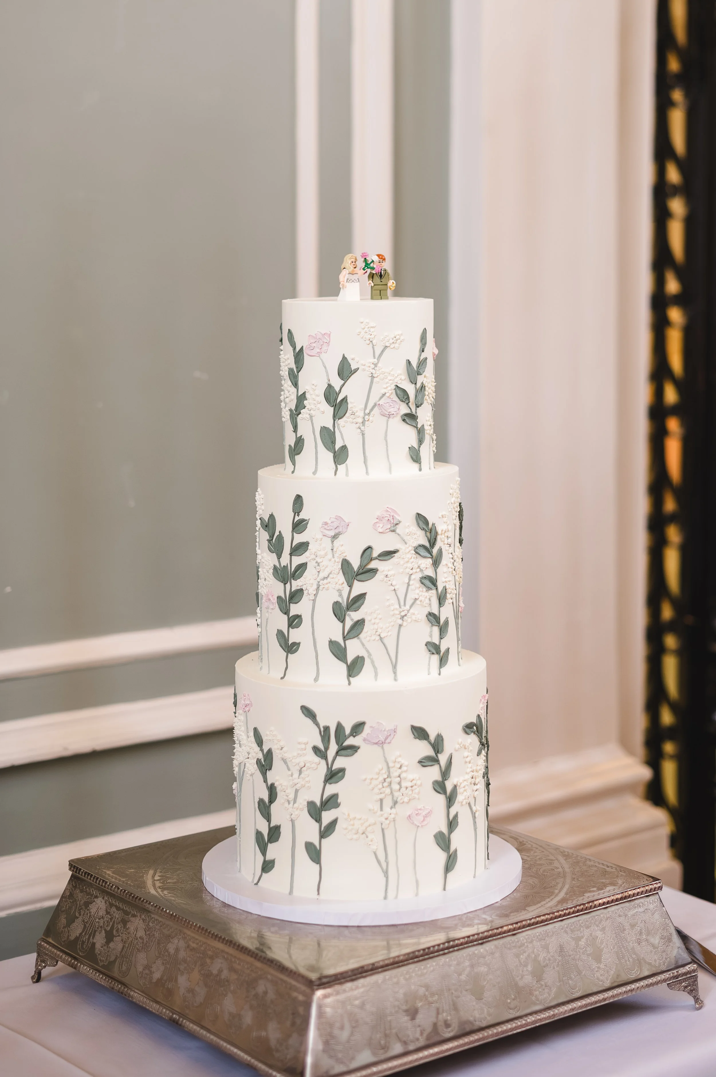 Emmanuel College Wedding Cake flowers and greenery