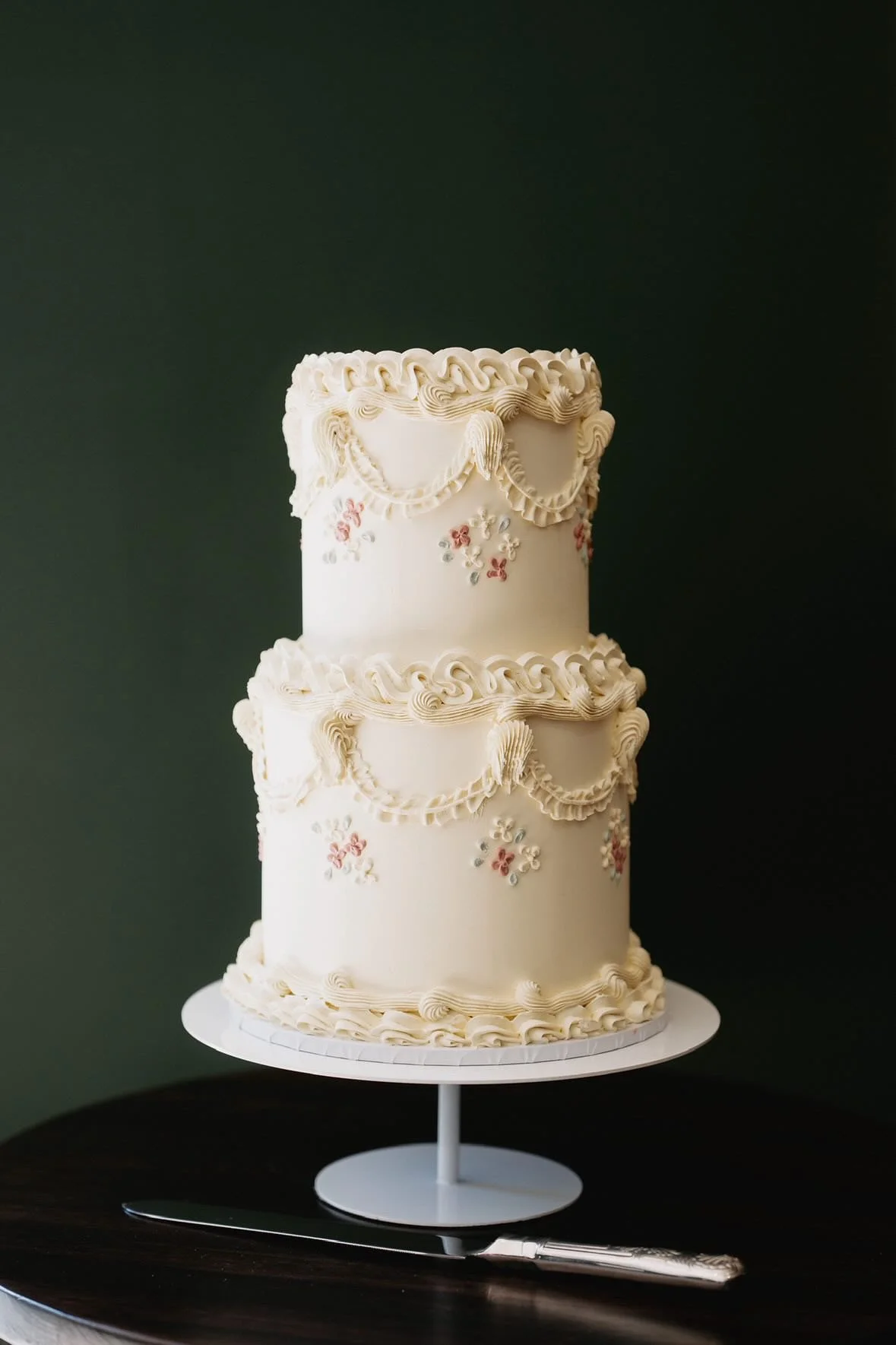 Two tier Vintage Lambeth Piped Wedding Cake with florals