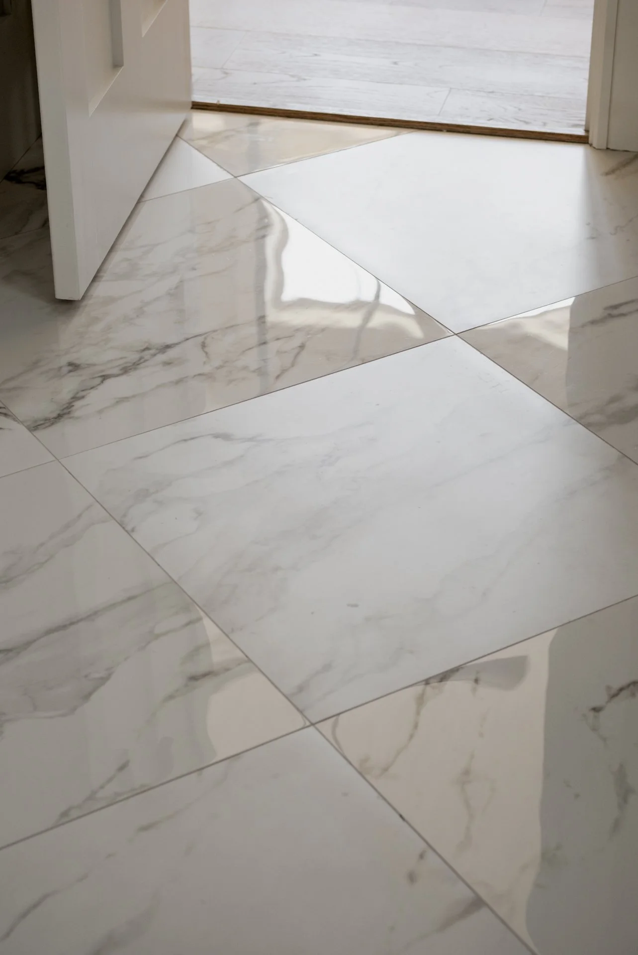 Beautiful checkerboard tile floors with alternating matte and polished finishes.