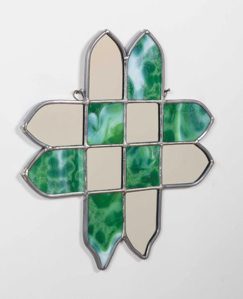Homecoming*, stained glass - mirror - lead came, 11”x11”, 2025, a badge to remember what once was..jpeg
