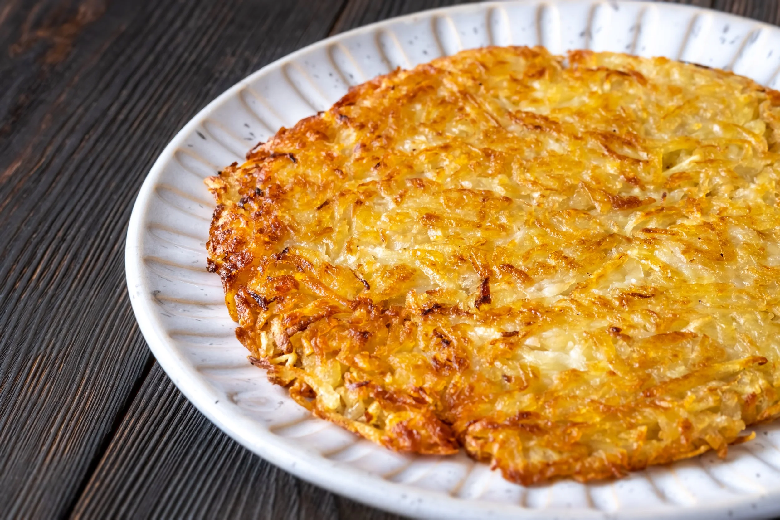 Rösti mit Bohnen und Speck