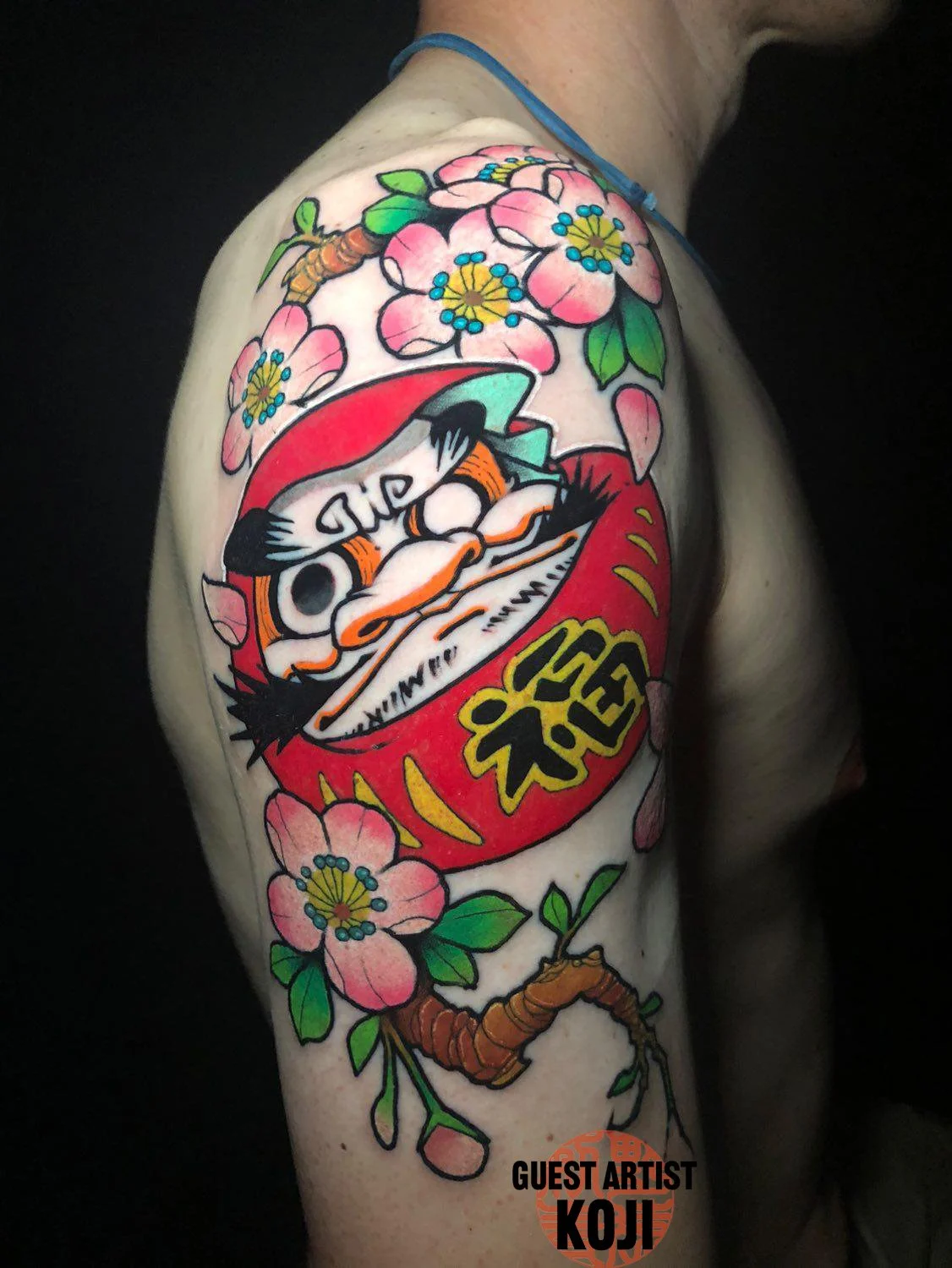 new school Japanese Daruma tattoo by Koji