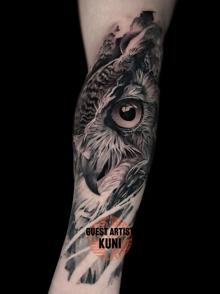Black and gray realistic owl tattoo by Kuni