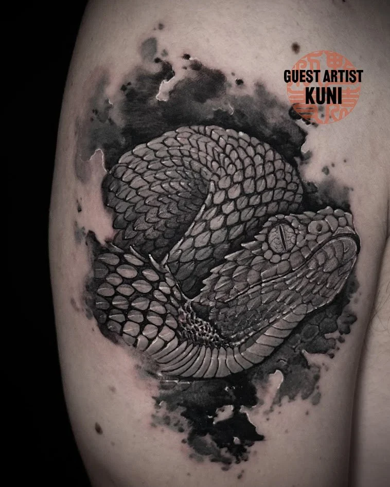 Black and gray realistic snake tattoo by Kuni