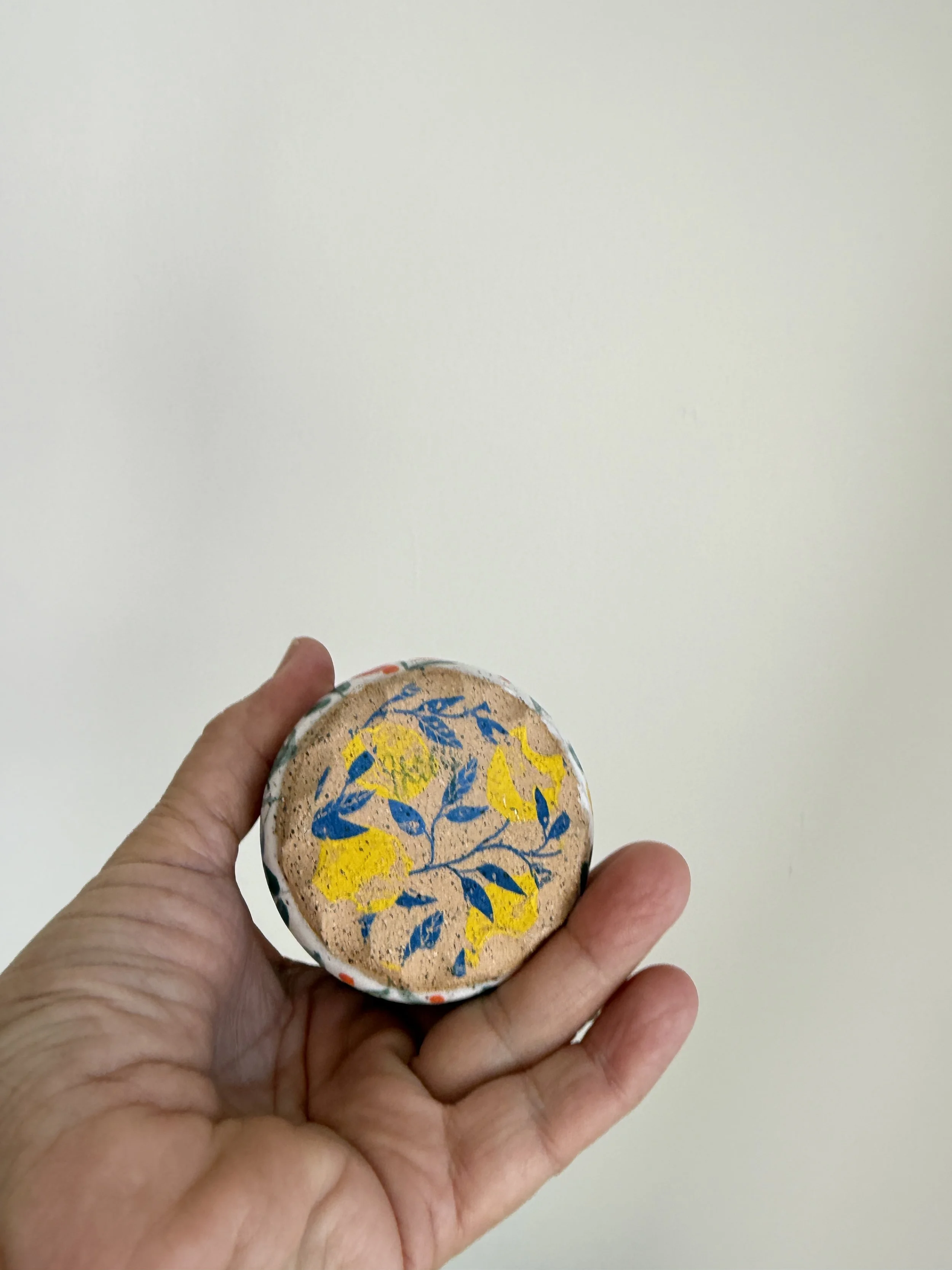 Lemon pattern on bottom of Purple Lupine Demistasse