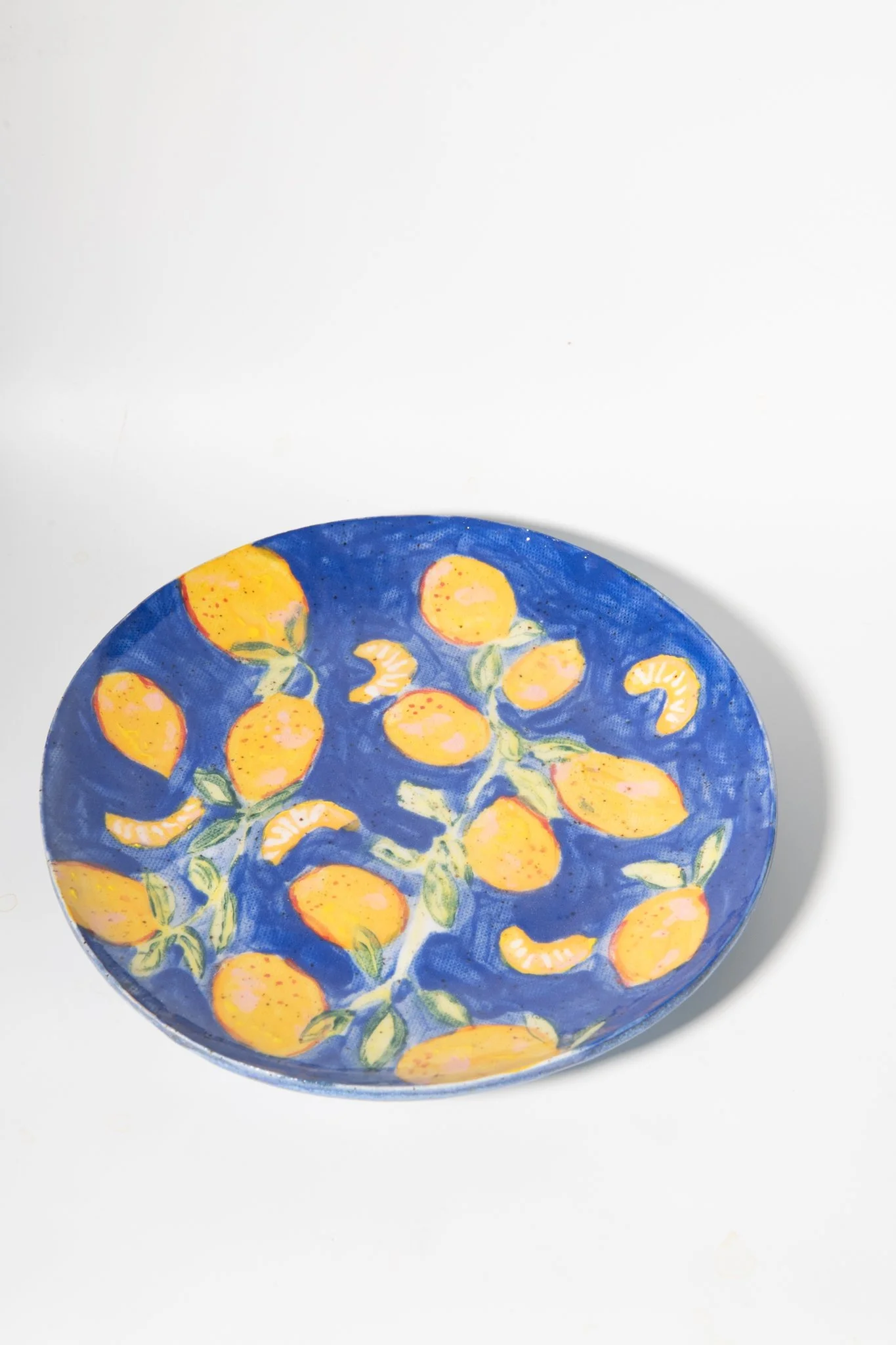 Handmade Lemon Dessert Plate on Cobalt Blue Background