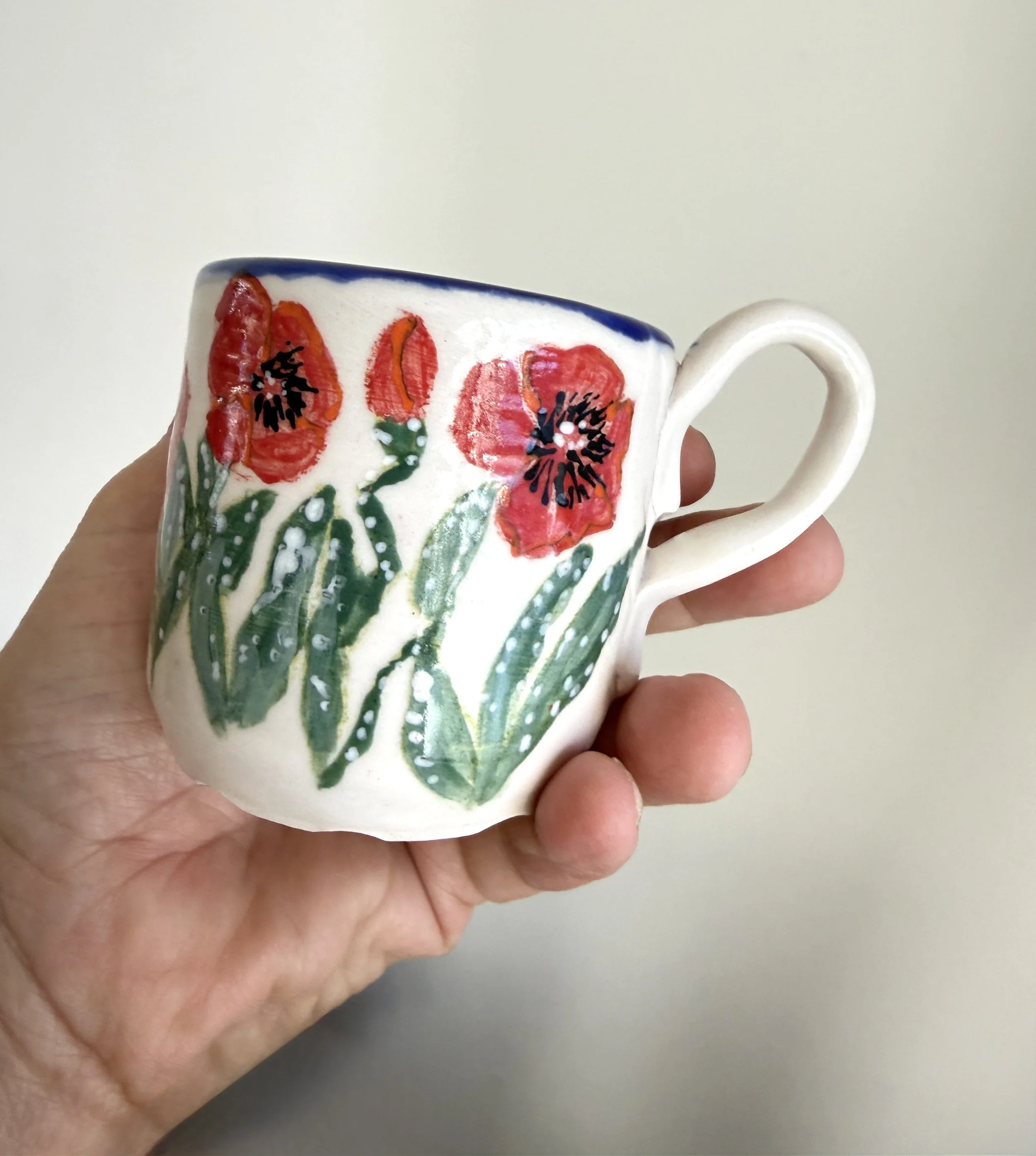 Red Poppies on Demistasse