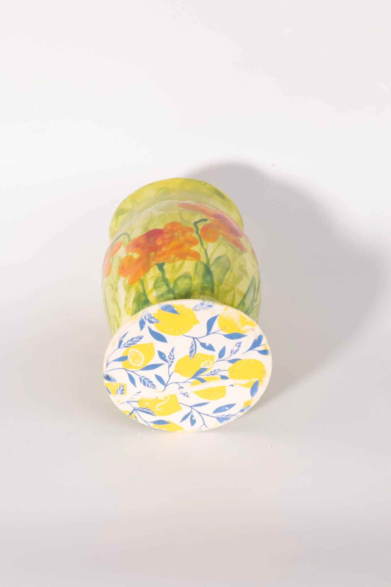 Bottom view of Handmade Yellow Green Vase with Orange Poppy Flowers