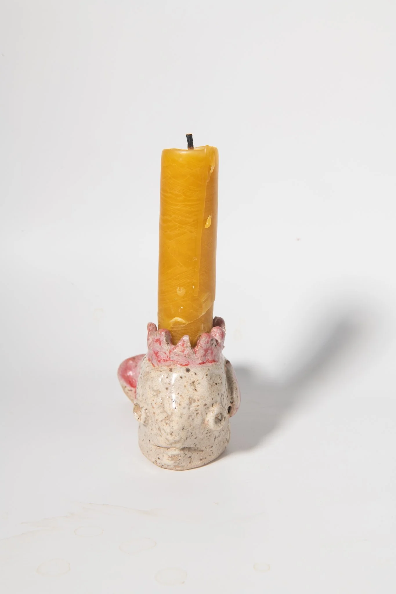Front view ceramic fish candlestick