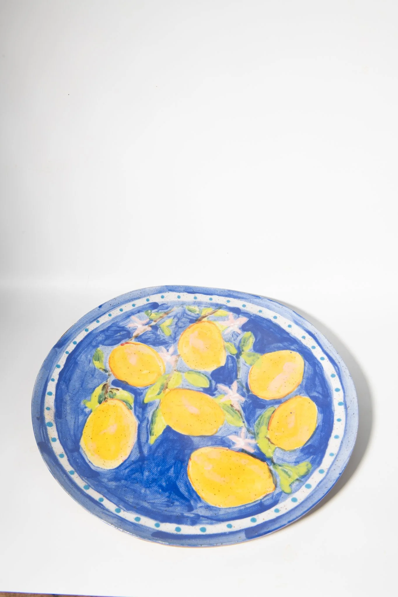 Handmade Lemon Plate with Blue Background