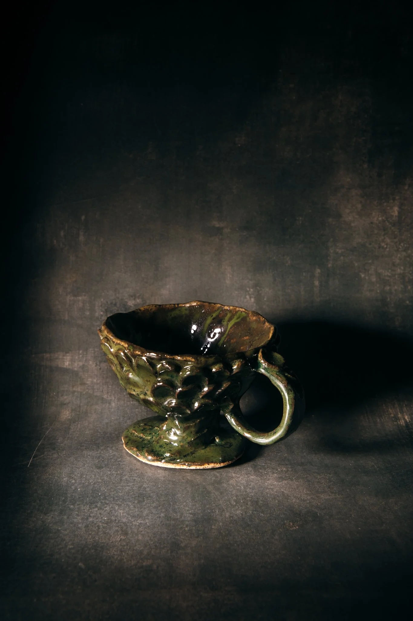 Whimsical Cup in a dramatic setting