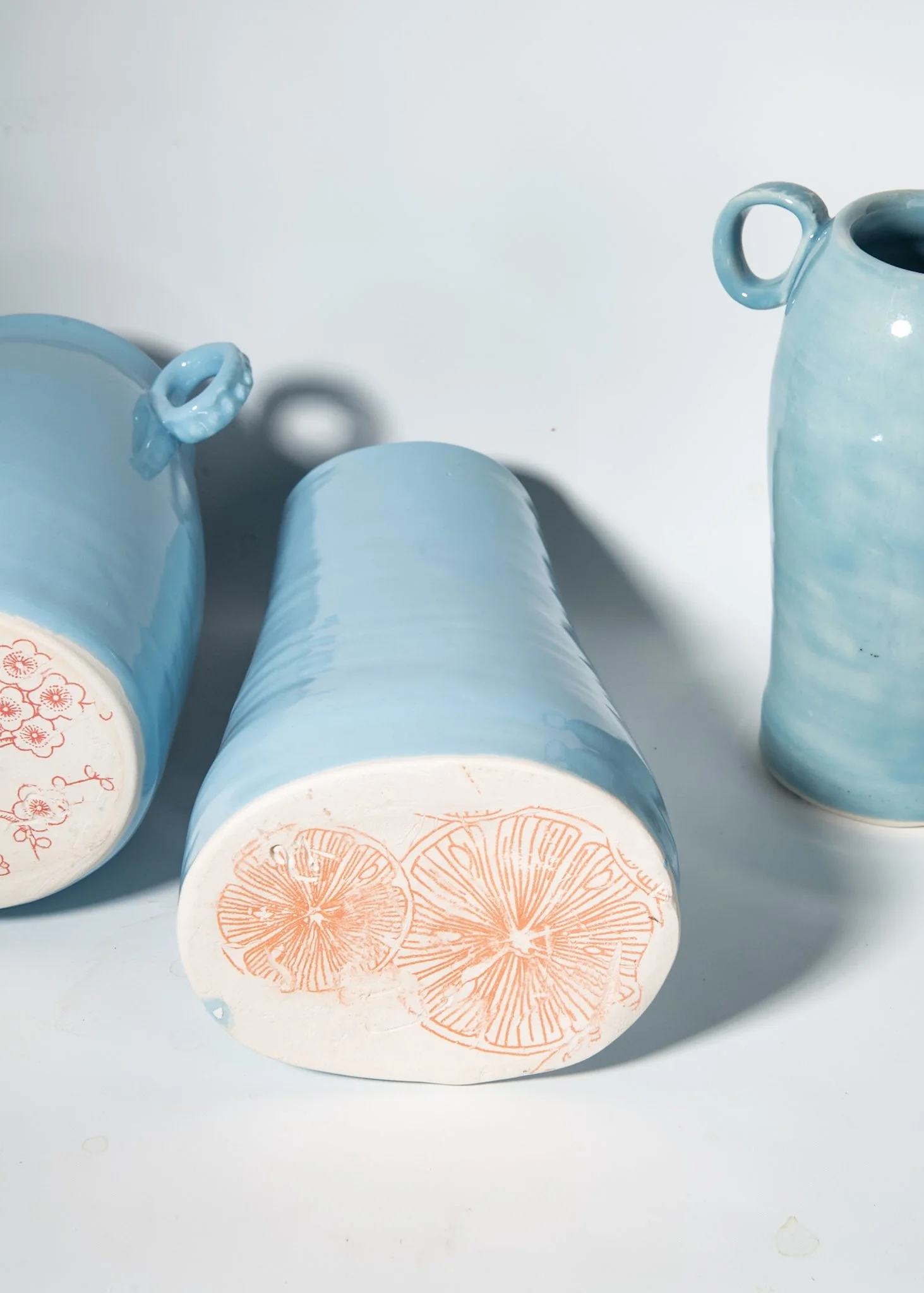 Orange Slices on Bottom of Ocean Blue Flower Vase