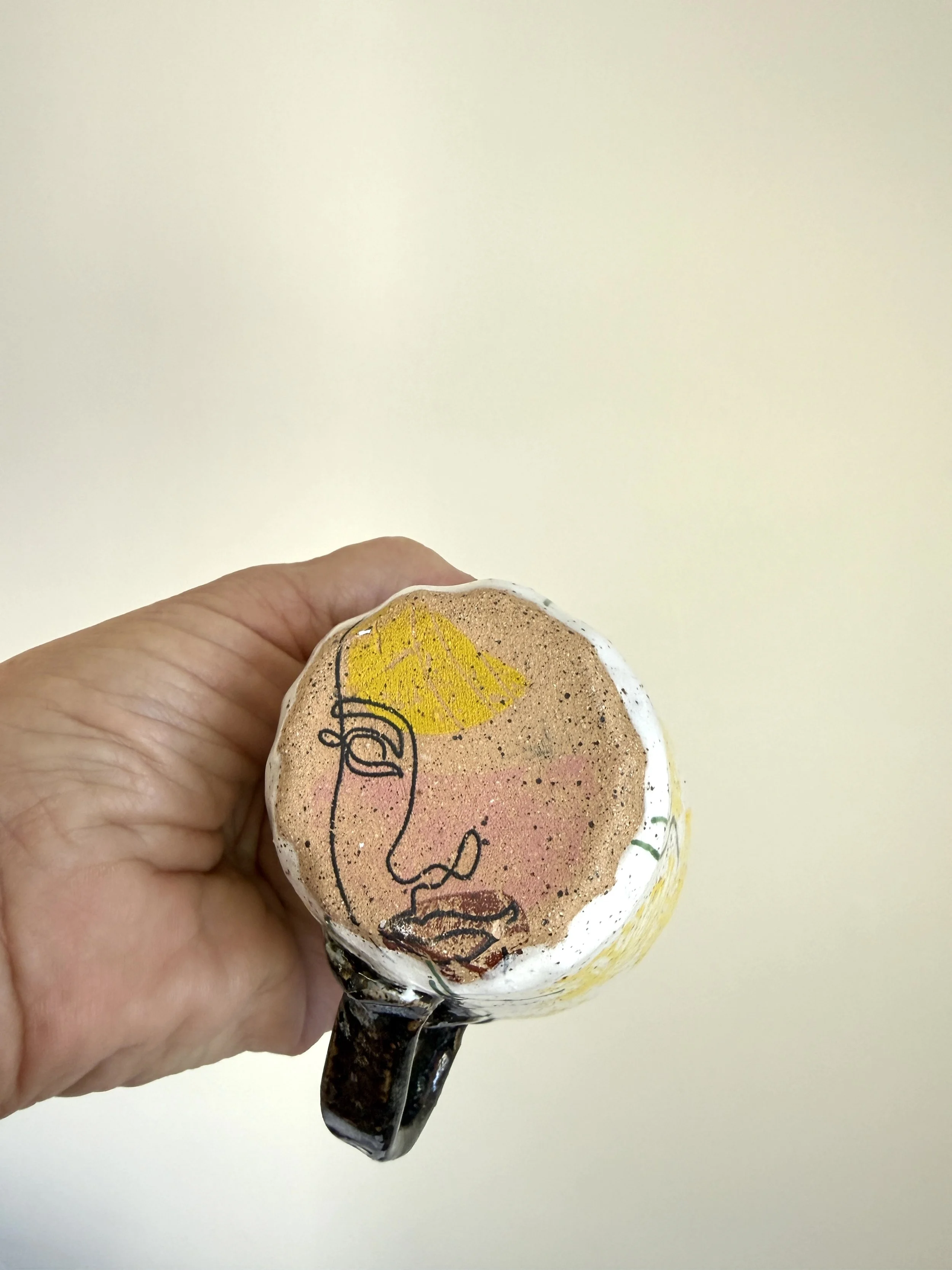 Bottom of lemon flowers with face drawing