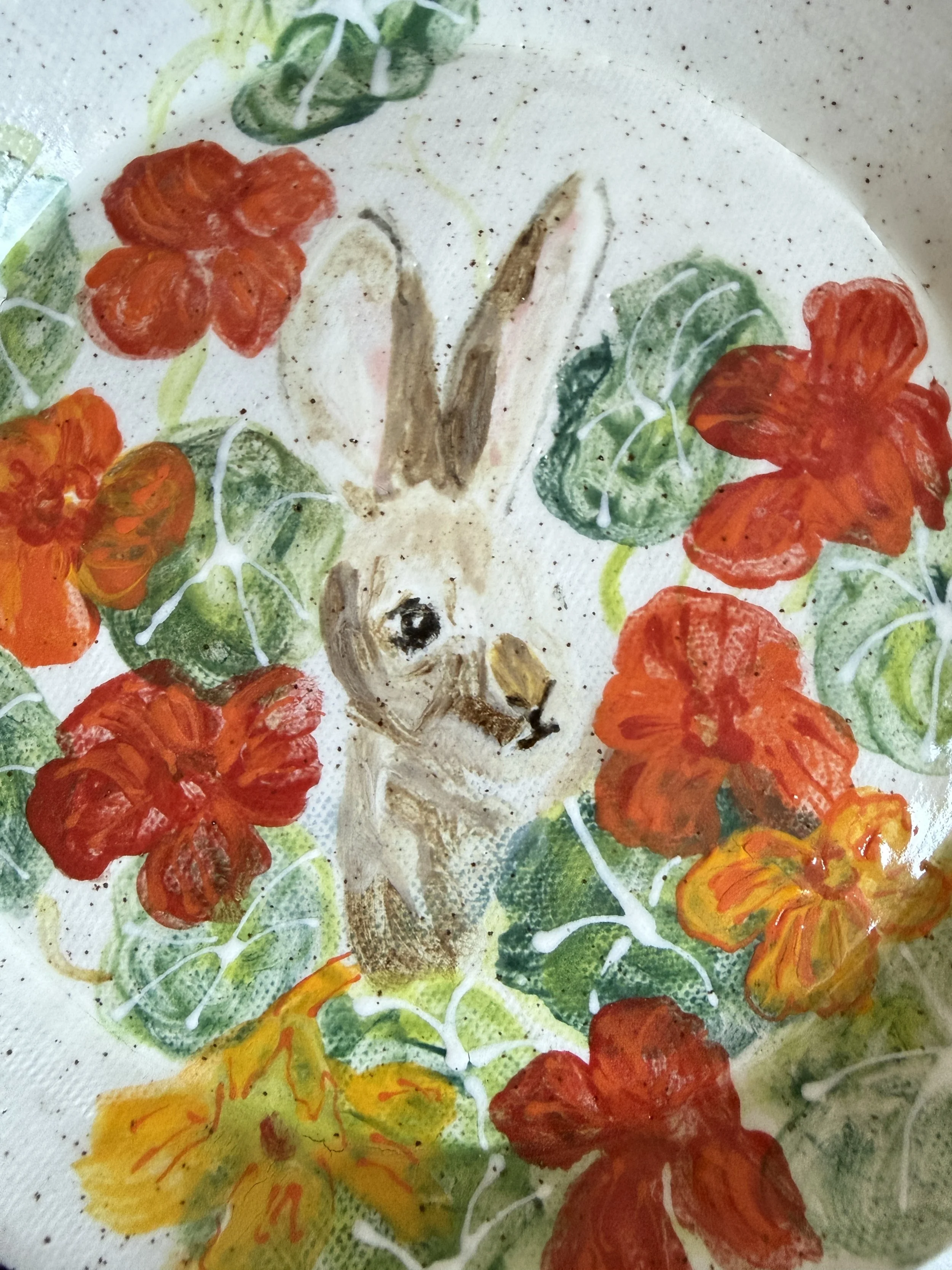 Bunny Looking Out from Nasturtium Flowers