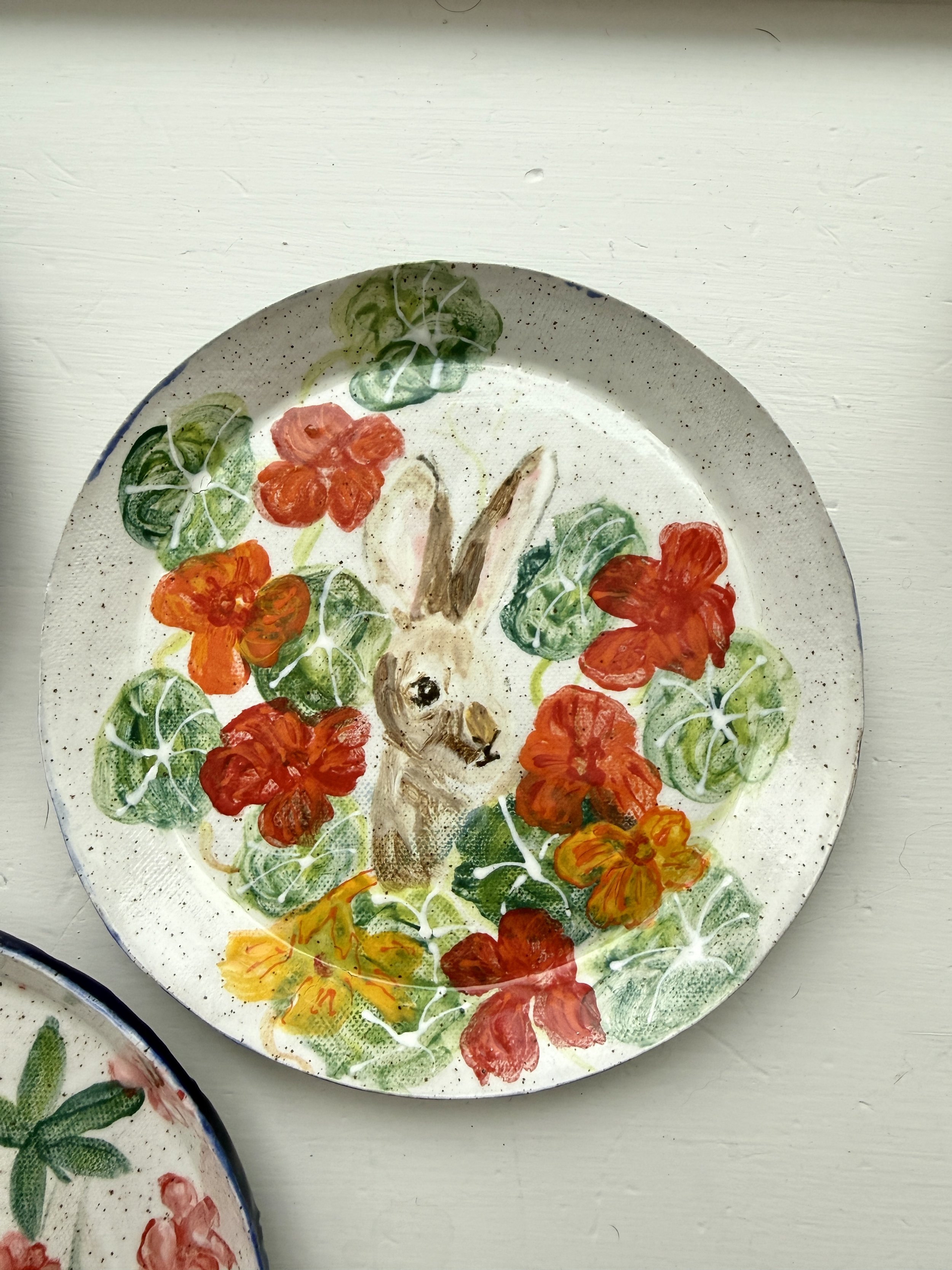 Bunny Looking Out of Nasturtium Flowers