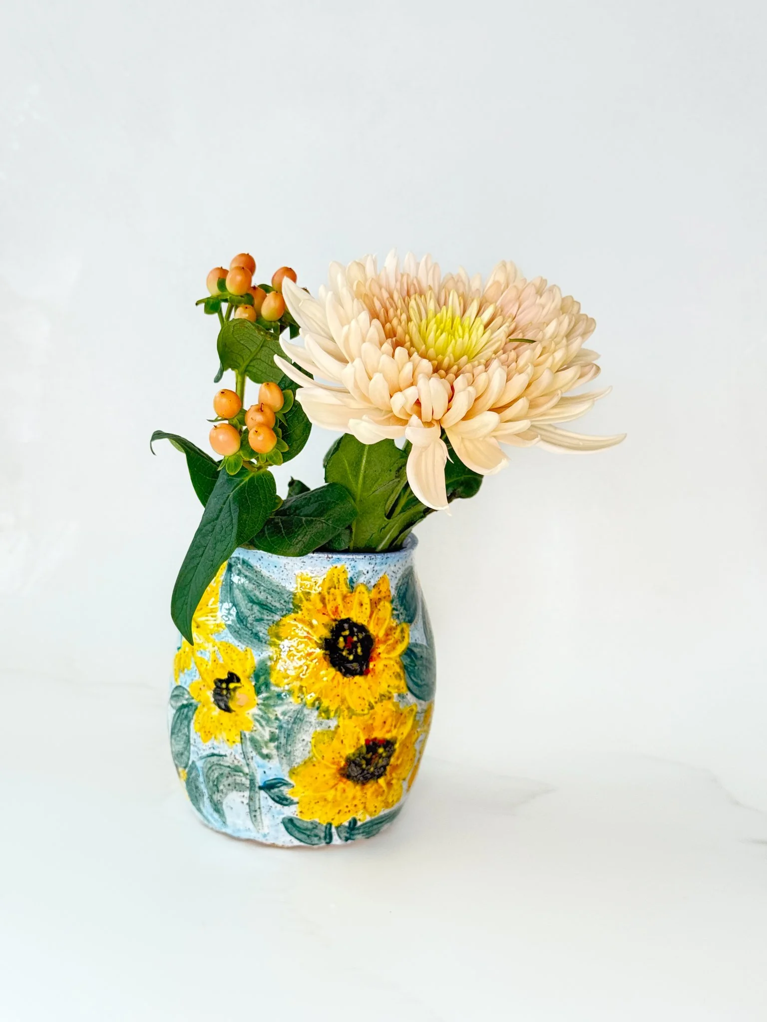 Another view of sunflower vase with bouquet of flowers