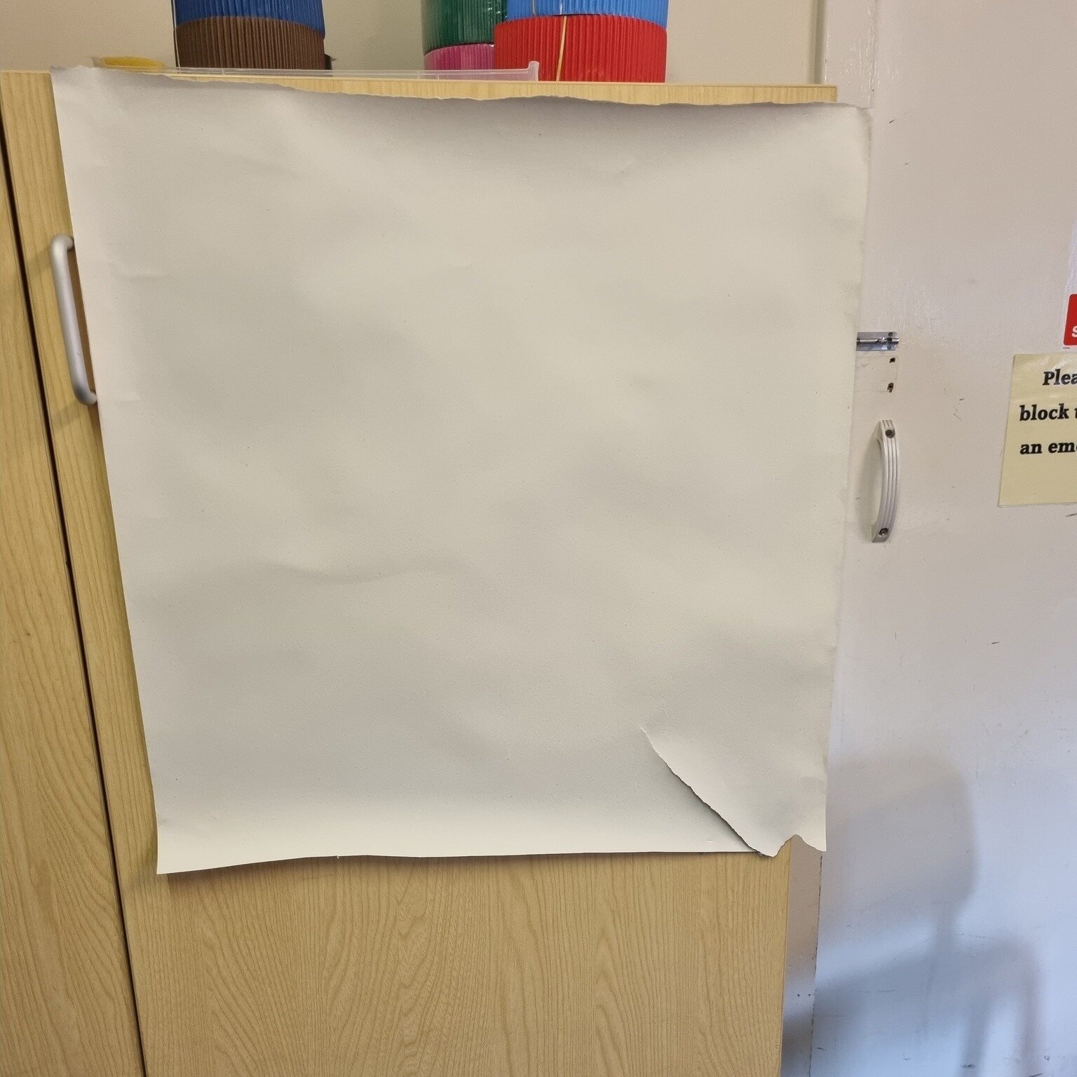 This is the reality of teaching independently. So often you are hiring a room which has to be adapted to your needs. 

There's no whiteboard - interactive or just plain old ordinary.

You often have to set out the tables and chairs.

Sometimes it's a