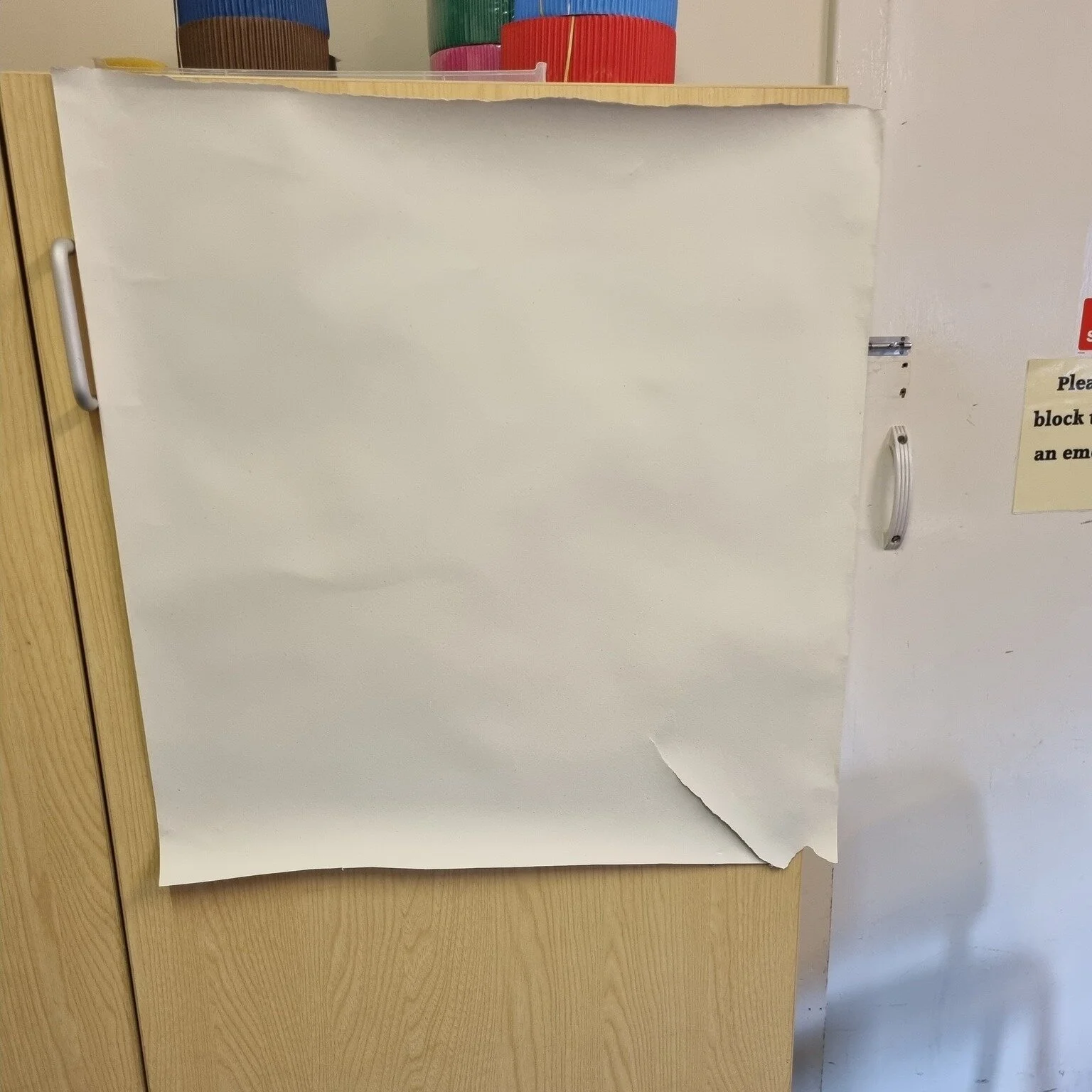 This is the reality of teaching independently. So often you are hiring a room which has to be adapted to your needs. 
There's no whiteboard - interactive or just plain old ordinary.
You often have to set out the tables and chairs.
Sometimes it's a