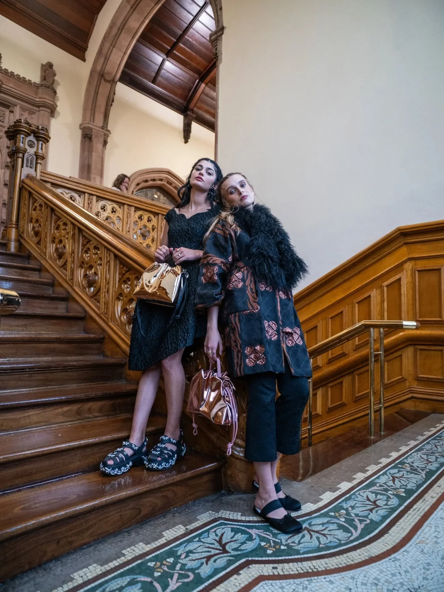 Inspired by the grandeur of the National Portrait Gallery in London,  in particular the historical portrait section with its sombre tones and ornate frames, we shot the AW25 campaign in the landmark gothic building of @guildhallderry . 
Featuring the