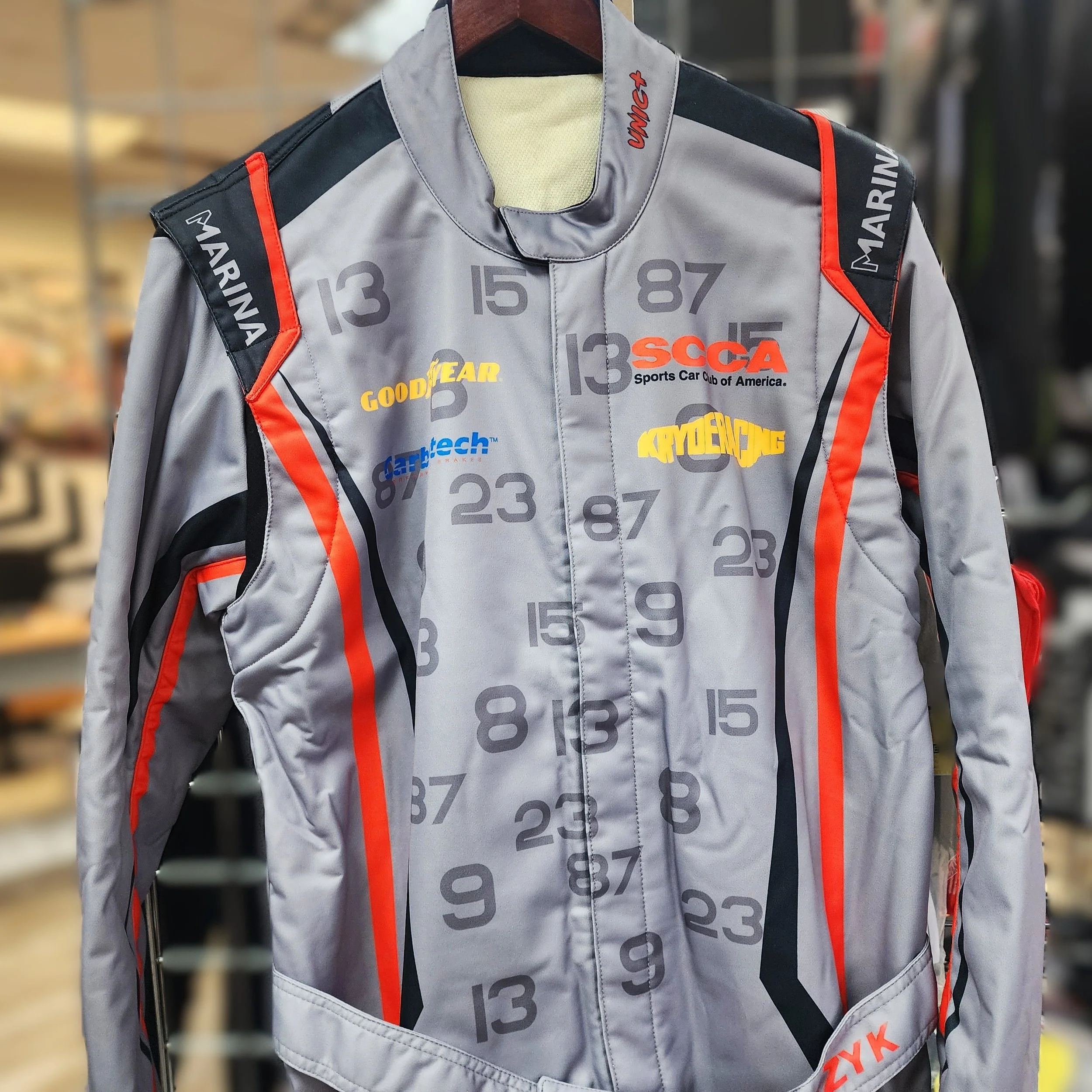 Customer Rob P has a new custom suit. Racing with SCCA and with numbers that are specially relevant to him and his family.