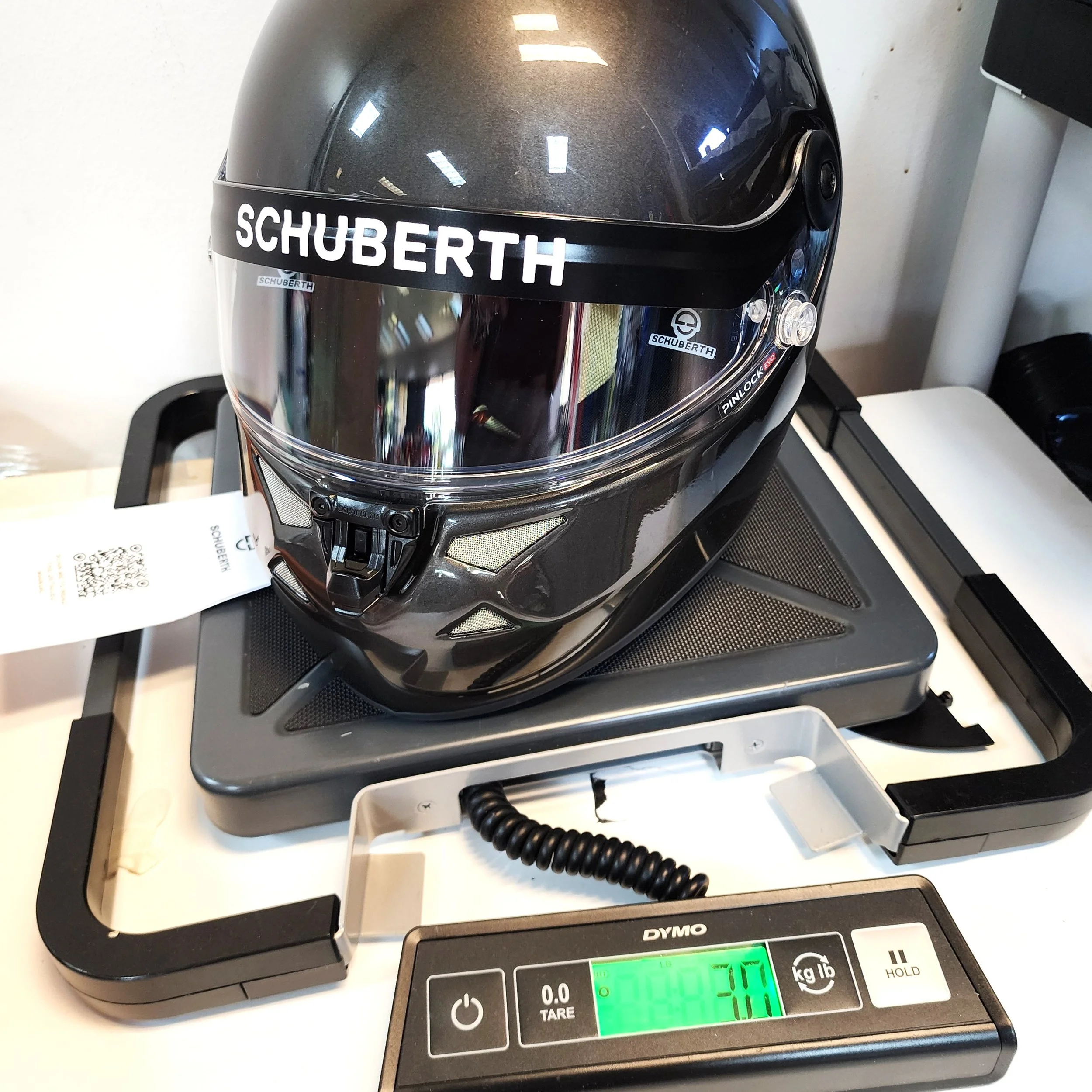 Schuberth SP1 hybrid racing helmet  on scales 3lbs weight