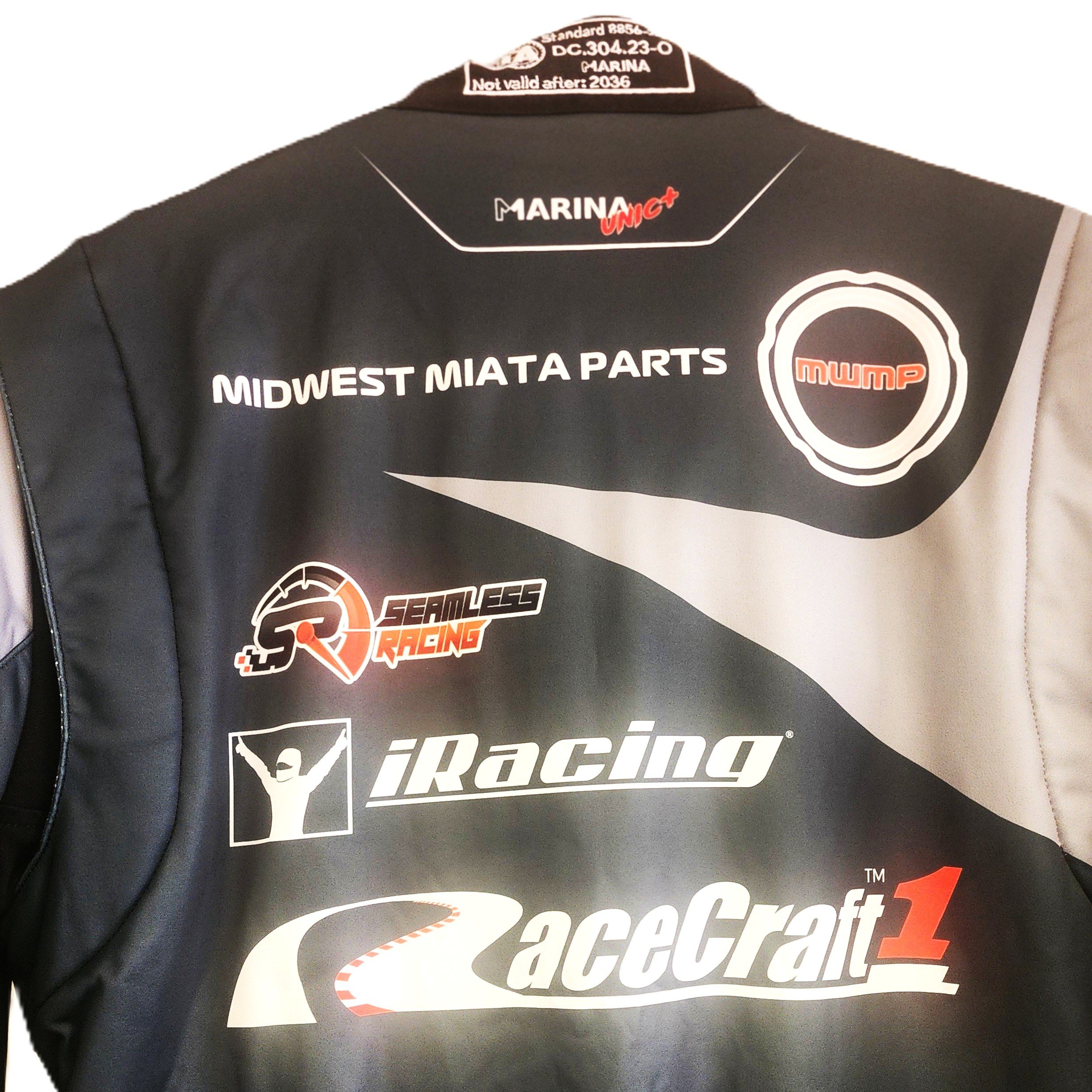 The back of our customer John A new Marina  custom suit. We chose a template that matched John's aesthetics and fitted all his promo  needs.