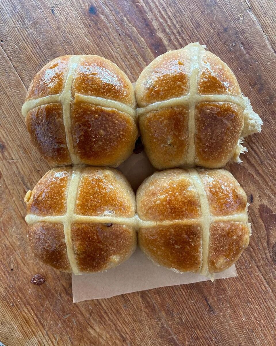 Hello Spring! Have you tried our delicious sourdough hot cross buns? Freshly delivered from our bakery every Wednesday and Saturday straight from the oven! 

Each little bun has been mixed, warm and cold proved, scaled and pre-shaped and rested and s