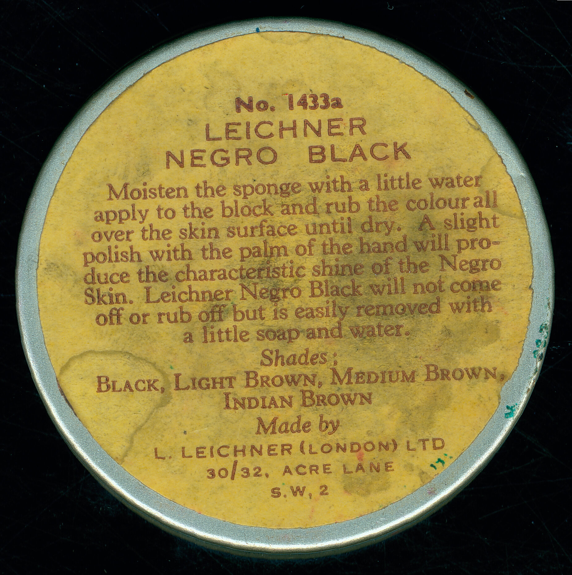 Tin of "Negro Black" face make-up used in performance