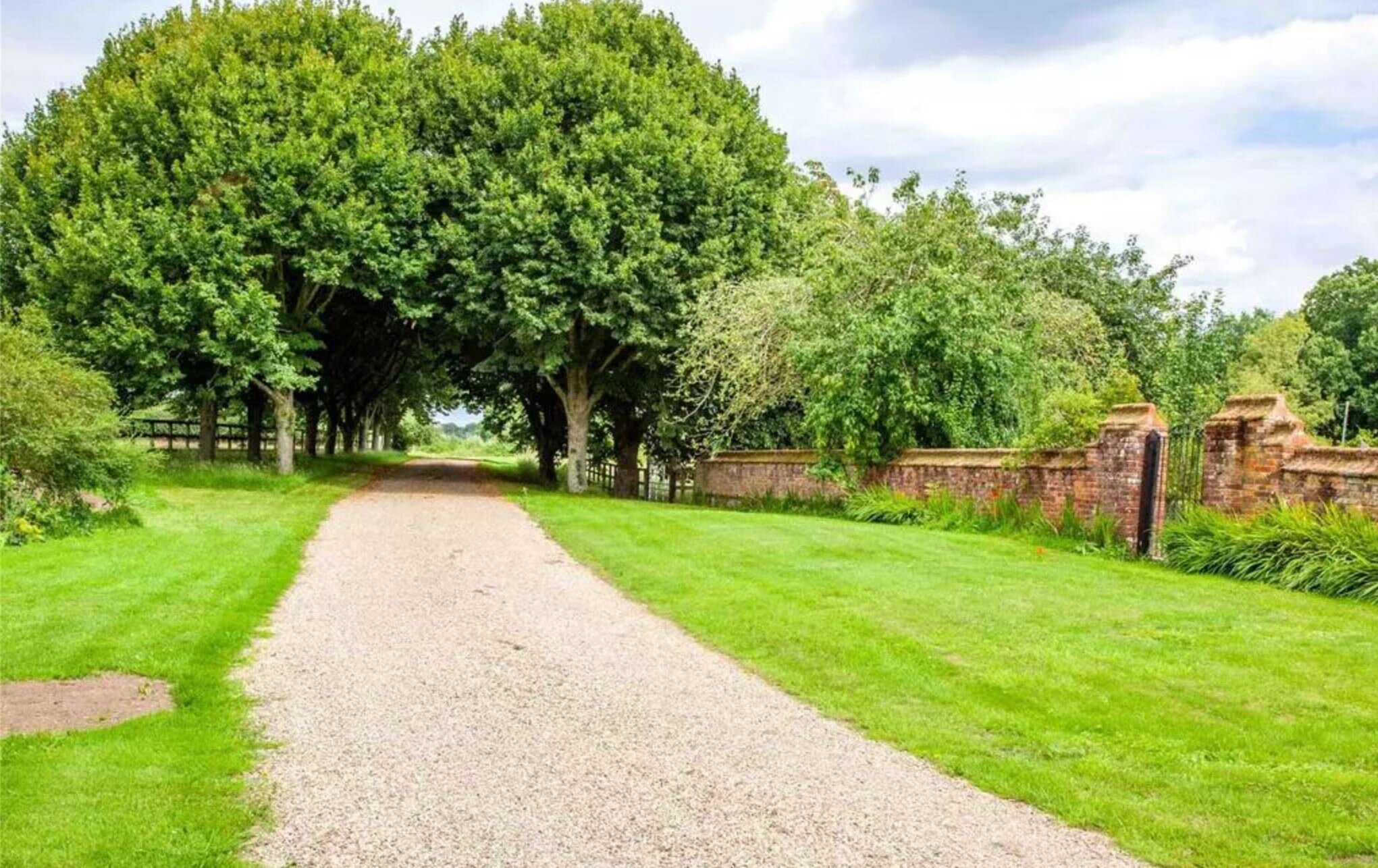 Tree lined driveway and walled garden.JPG