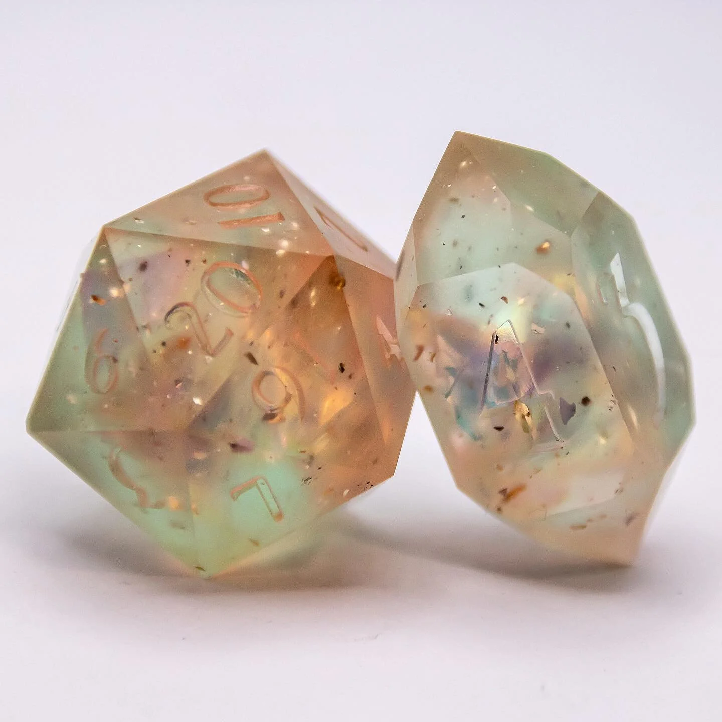 These two dice are the only ones that survived in the set, but I love them so much. What should I call them? Should I put them up as a duo or as singles?