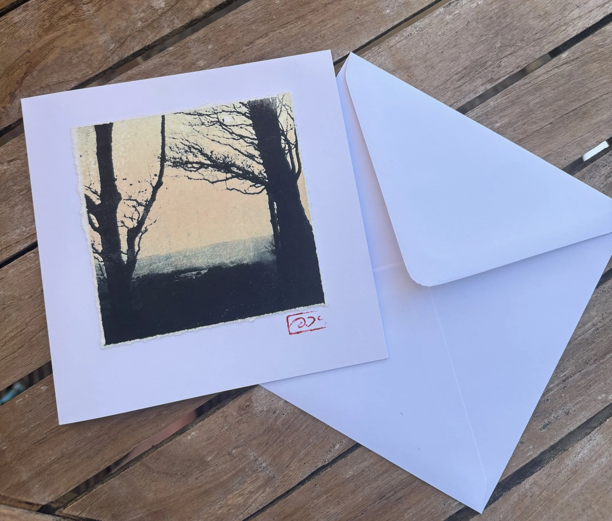 Card handmade glimpsed through trees.jpeg