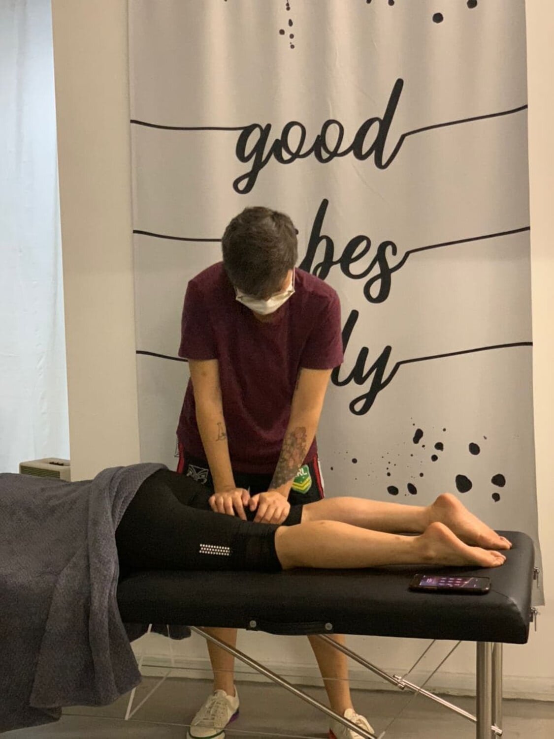 Sports Massage Therapist Massaging Thigh