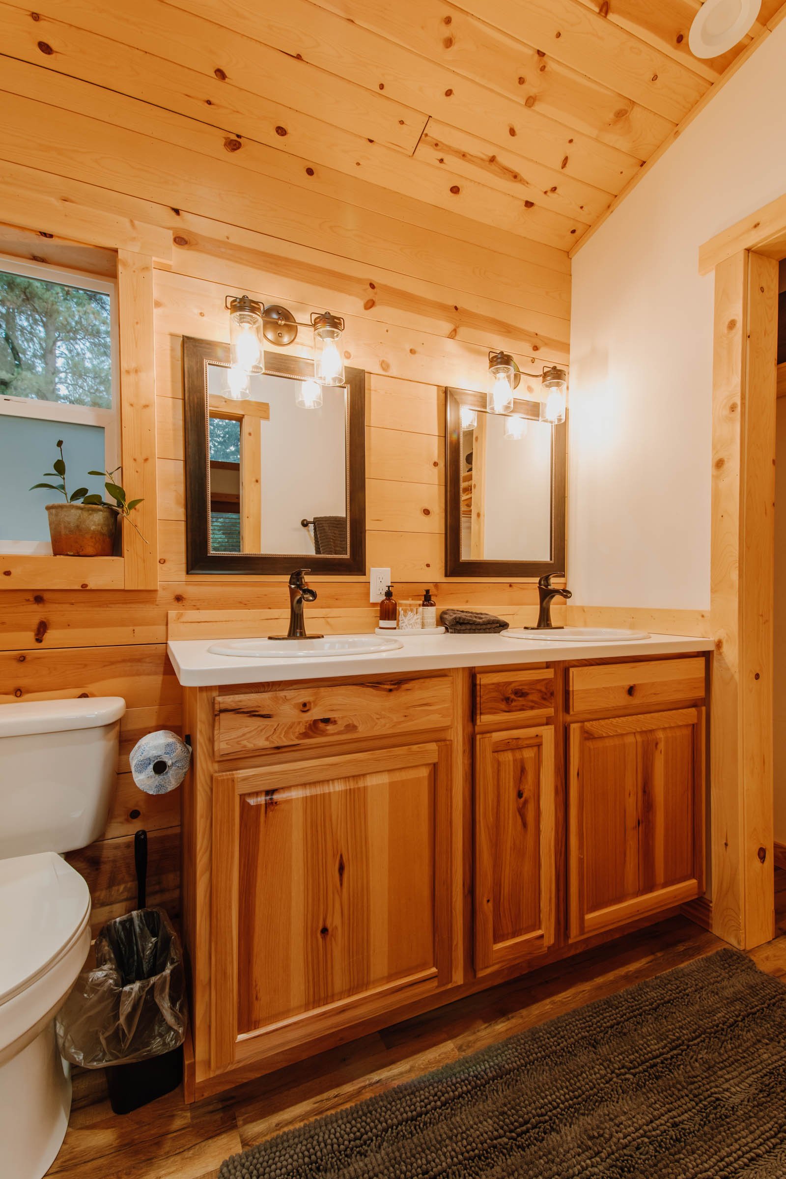 Cabin bathroom at theGather Indie Treehouse Washington Cabin