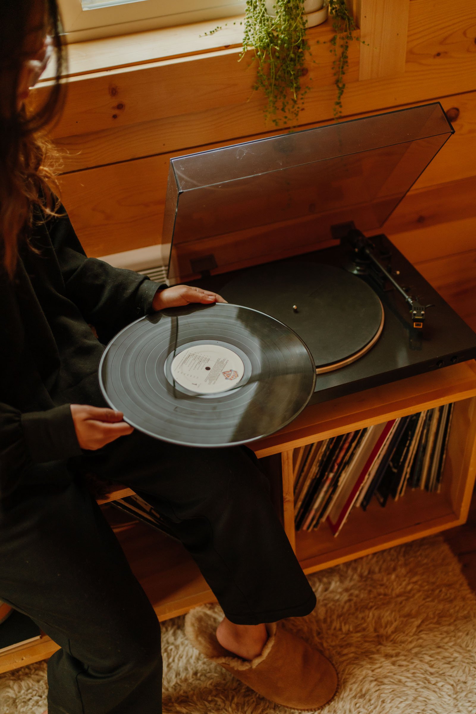 Playing records at the Gather Indie Treehouse Washington Cabin Rental