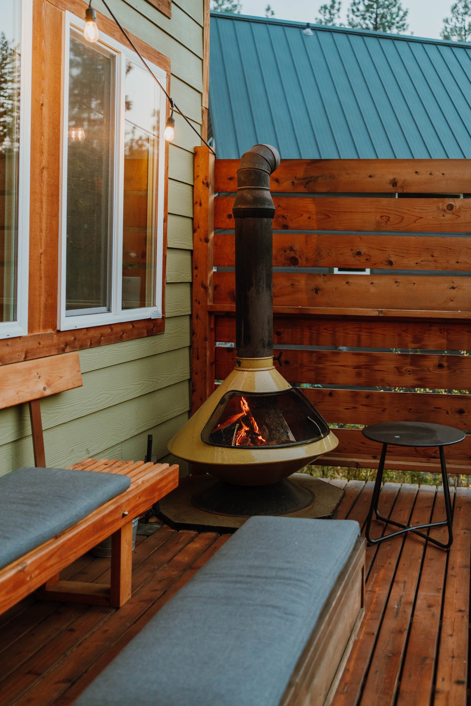 Vintage outdoor fireplace at the Gather Indie Treehouse in Washington
