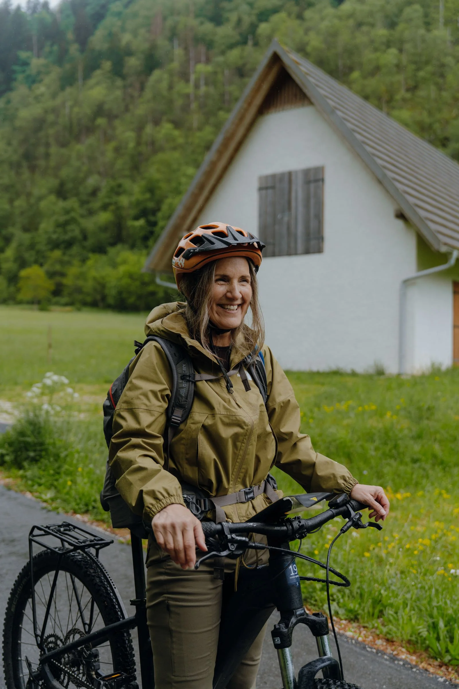 Woman biking Soca Valley, Alpe Adria Trail, Slovenia