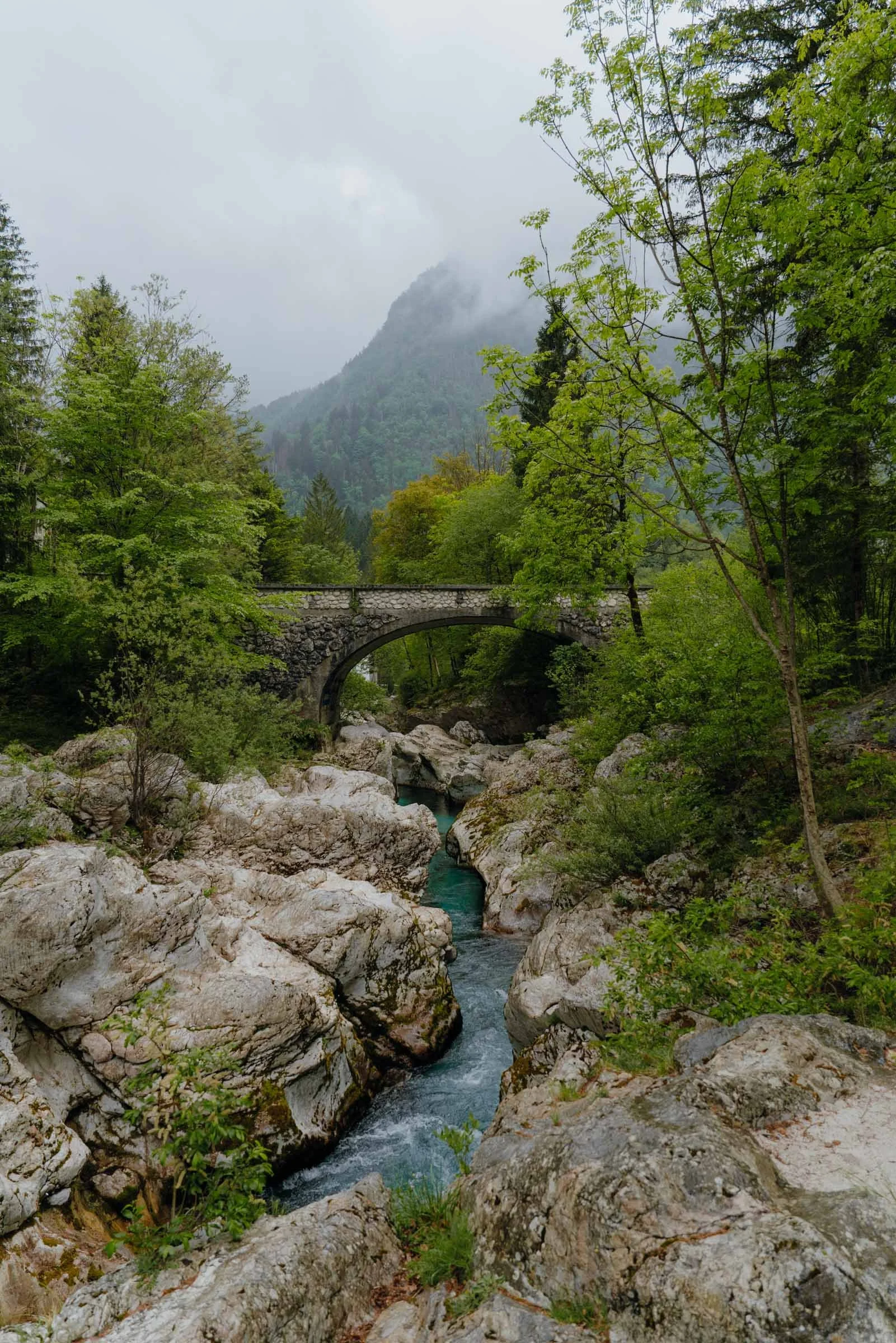 River with stone bridge in the Soca Valley, Alpe Adria Trail, Slovenia