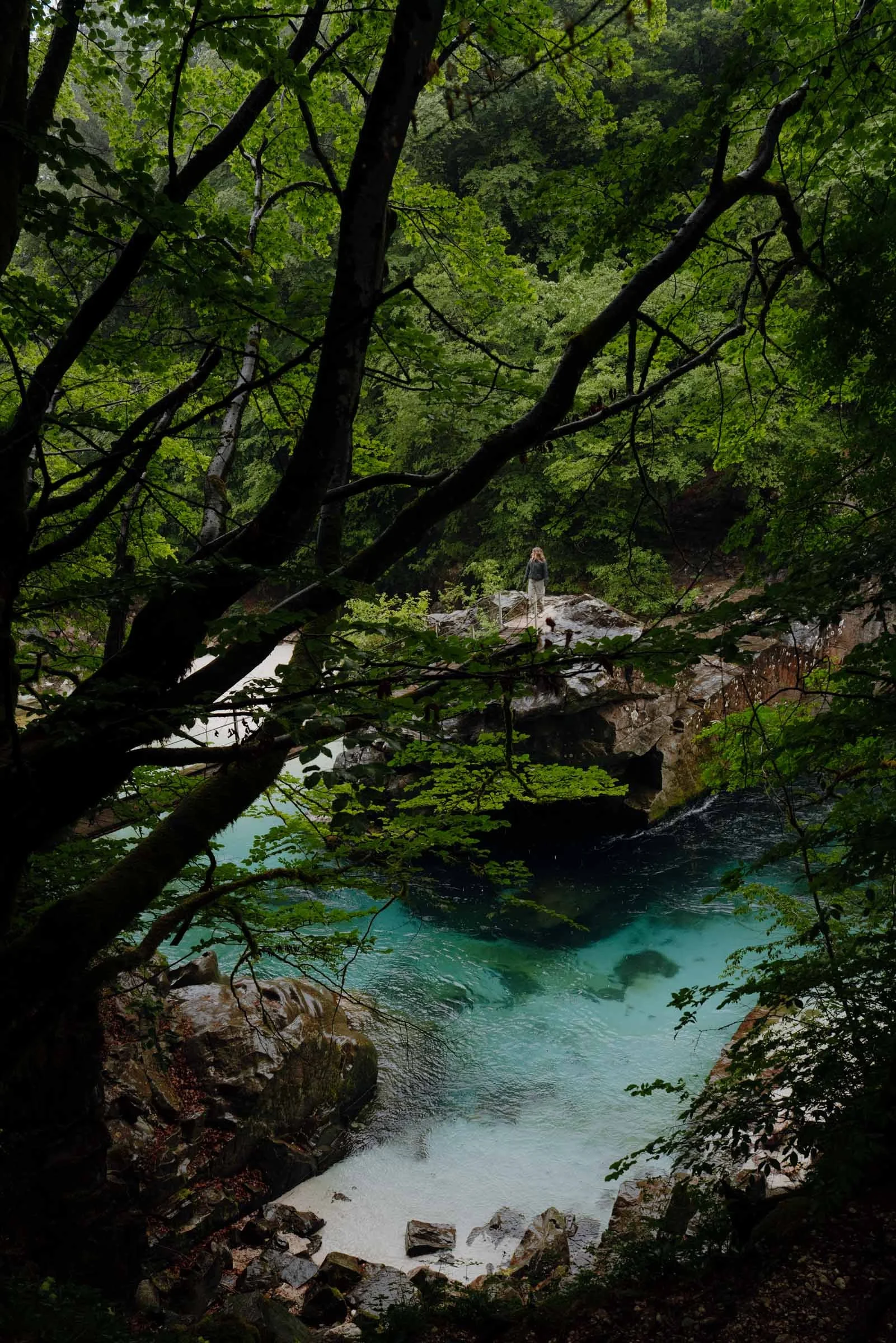 Woman on suspension bridge in the Soca Valley, Alpe Adria Trail, Slovenia