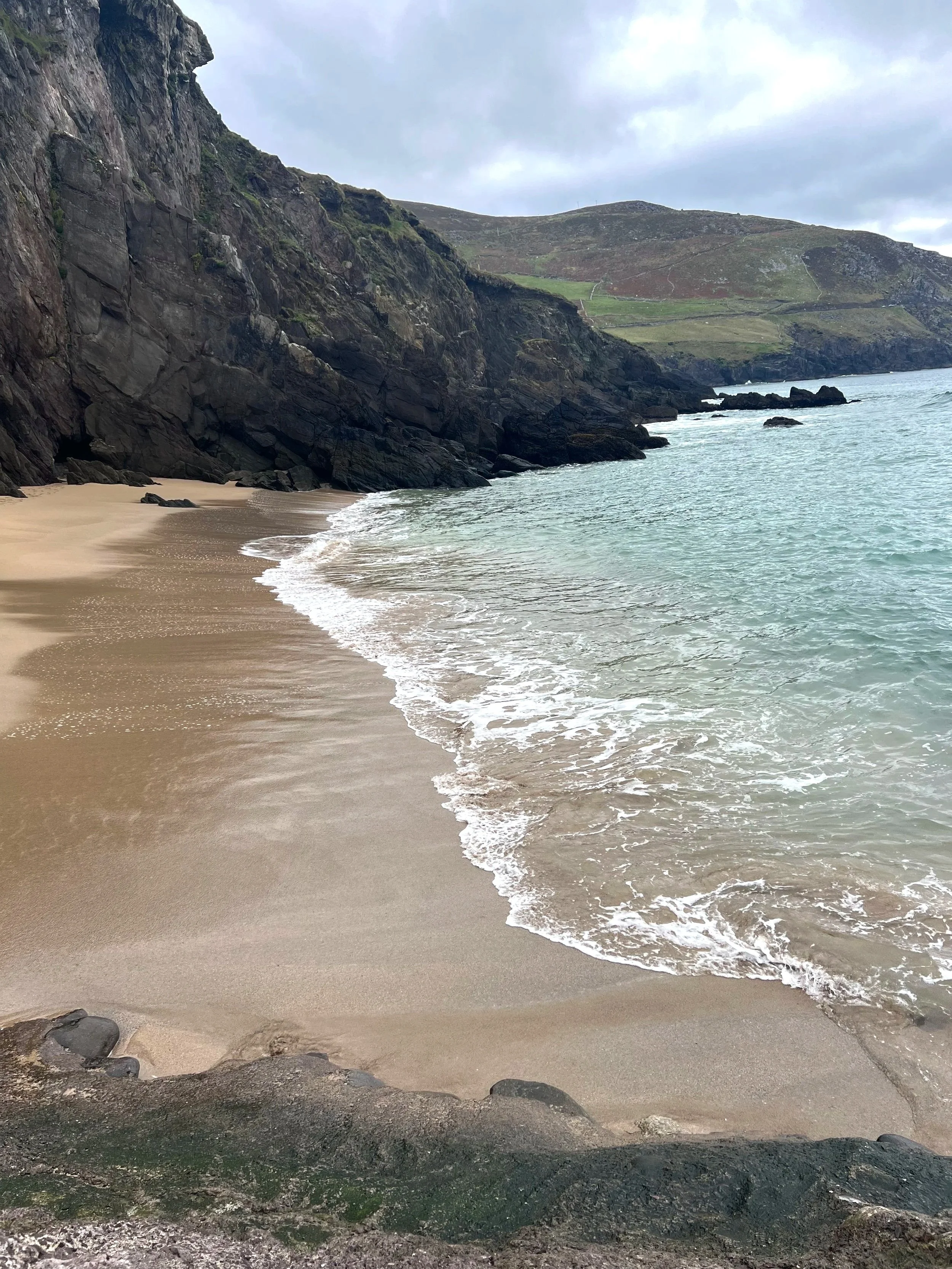 calm tide rolling toward the shore, reflecting steady movement, grounding, and the natural rhythm of each person’s unique journey. A Lot Like Living offers neurodivergent-affirming counseling where your path is accepted and honored.