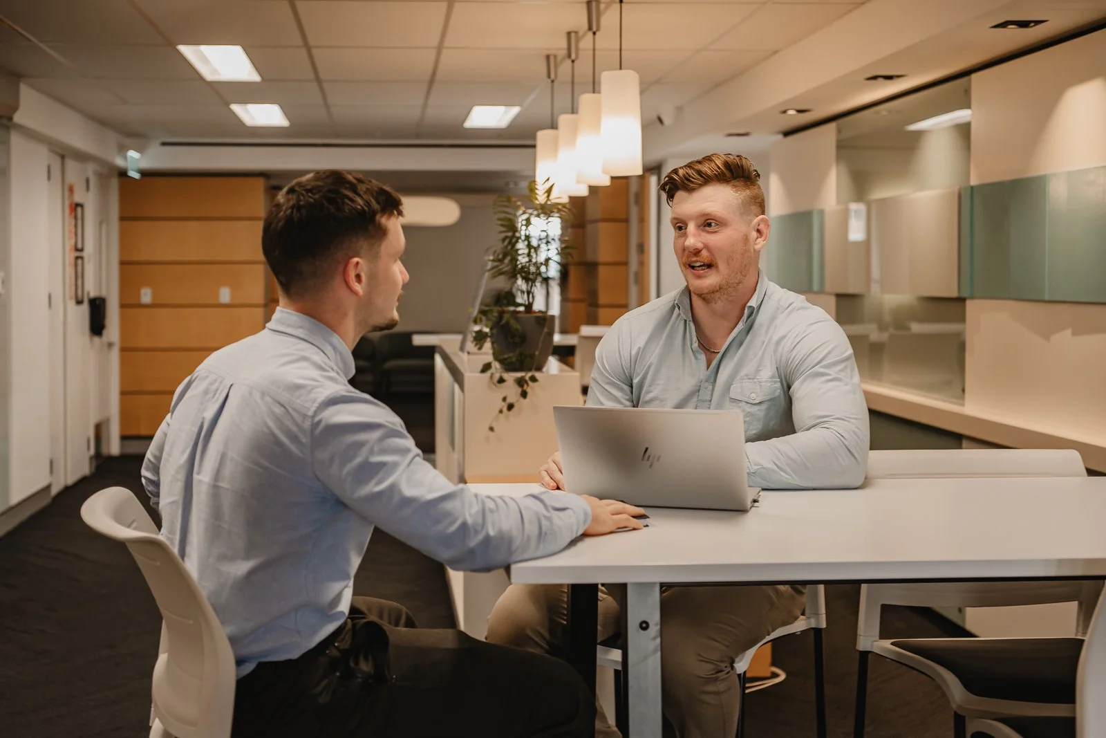 Workplace photography in Wellington featuring corporate handshake.