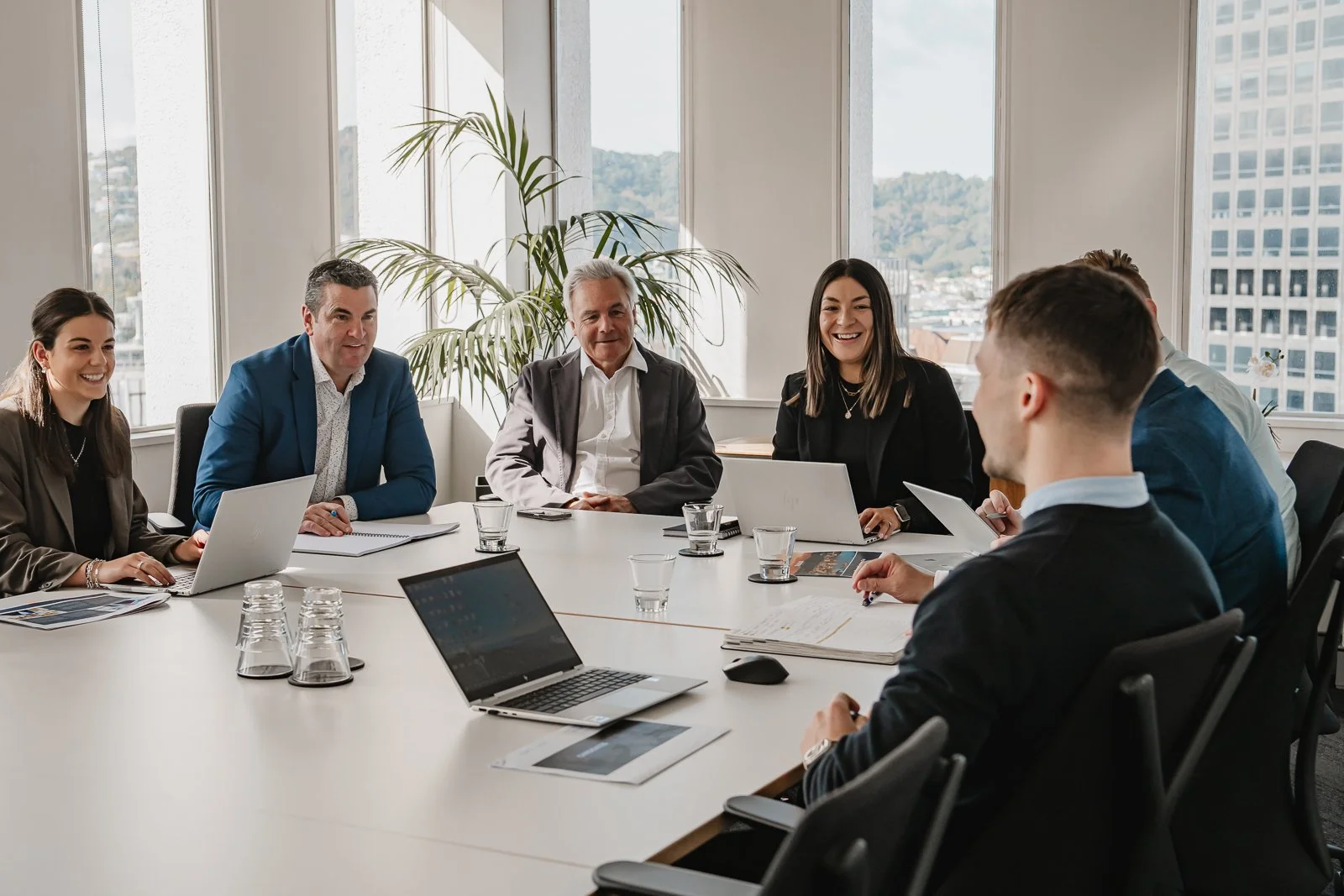 Corporate office photography in Wellington showcasing team interaction.