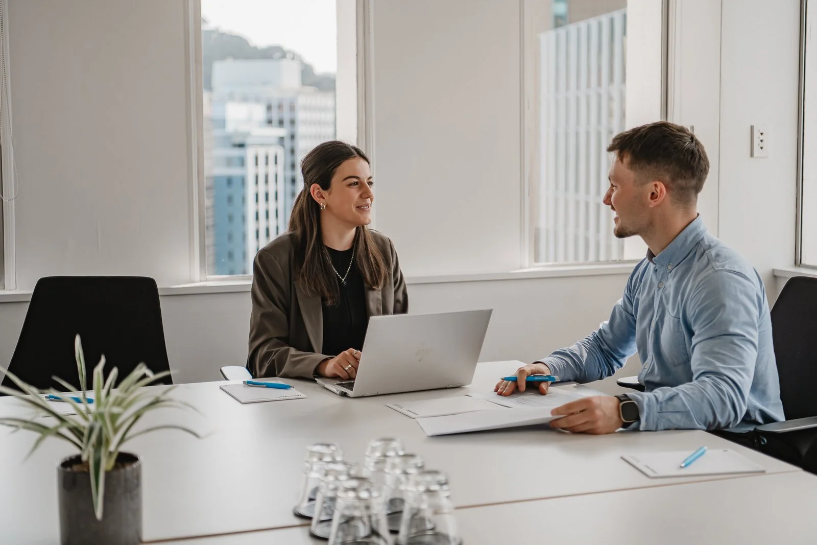 Professional workplace photography in Wellington capturing business discussion.