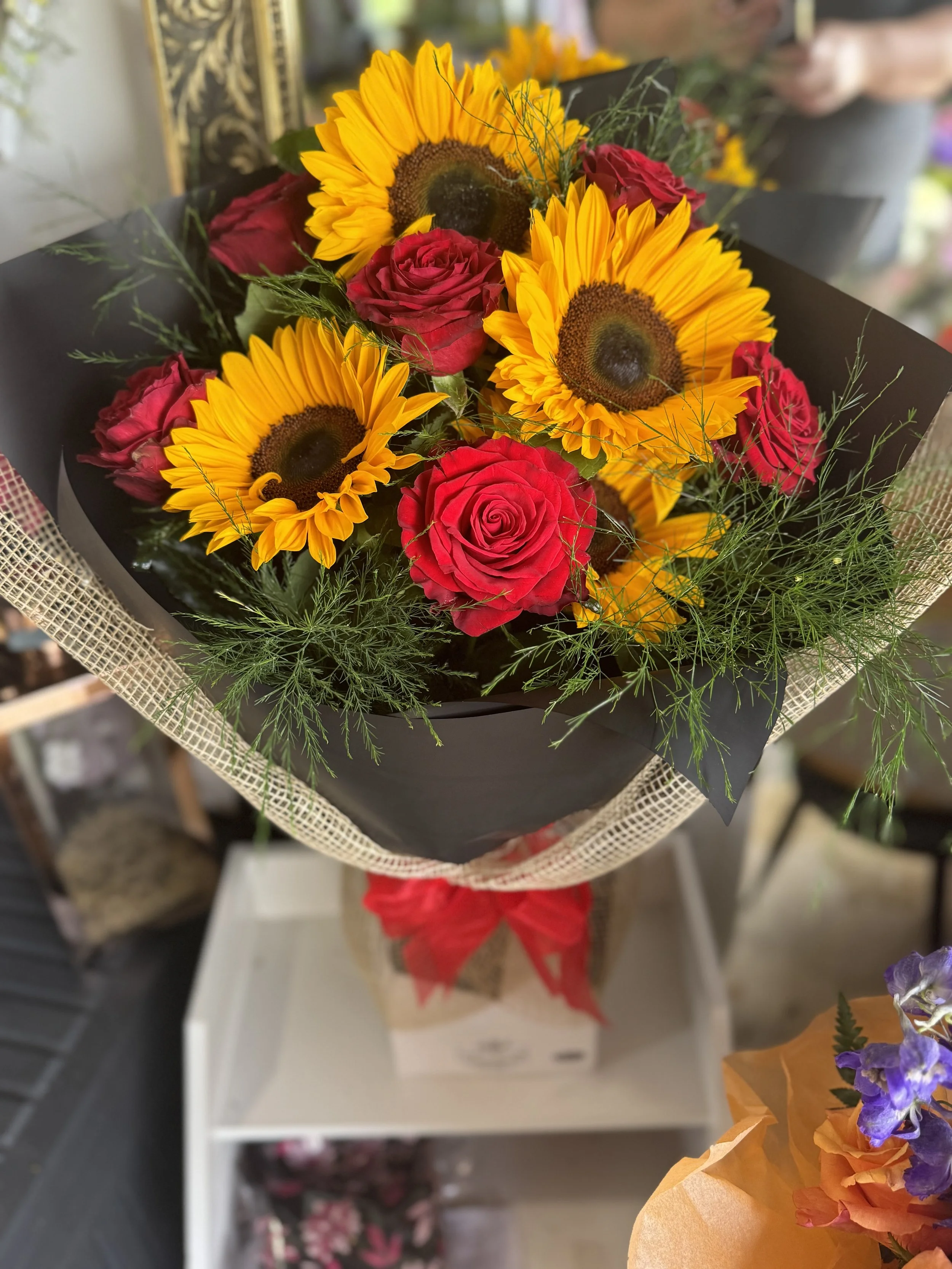Sunflowers and Red Roses
