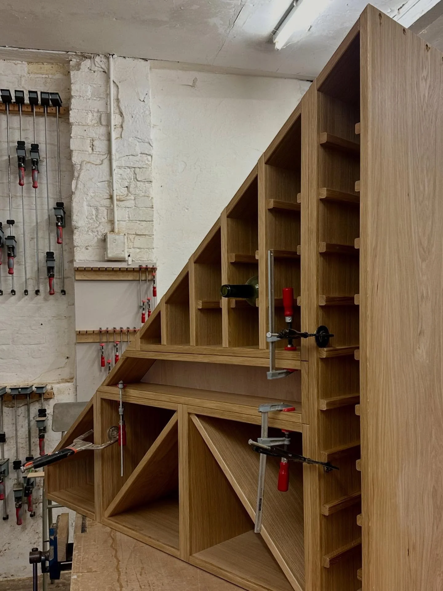 Wine cellar cabinets finish now to sort the lights and glass. #cabinetmaker #winecellars #bespokeinteriors