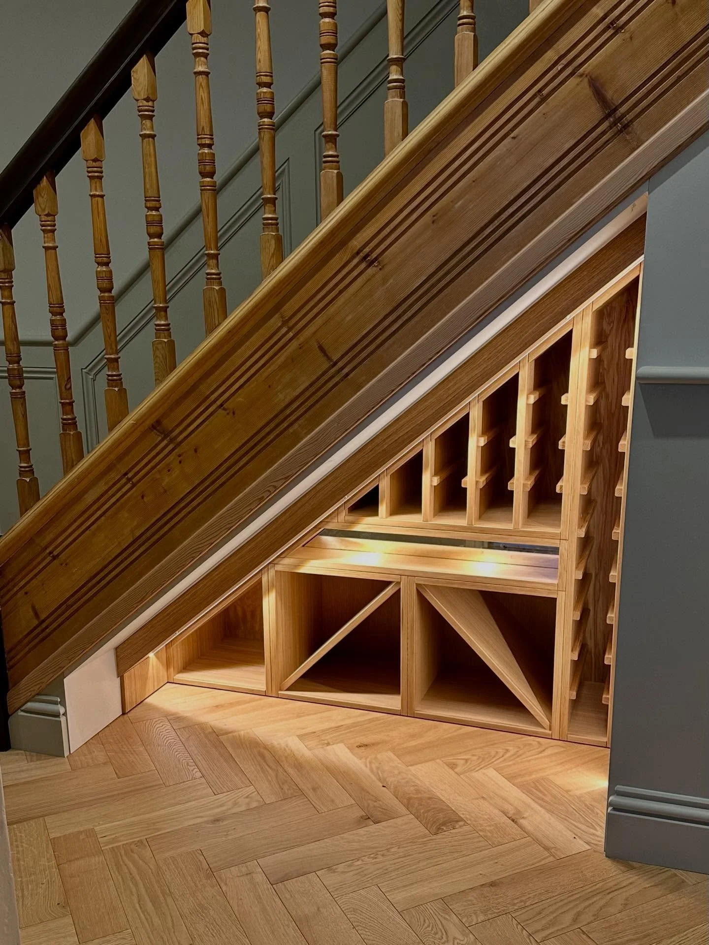 Great day installing all of the cabinetry for our wine cellar project just the glass doors to go. #understairstorage #winecellardesign #bespokeinteriors