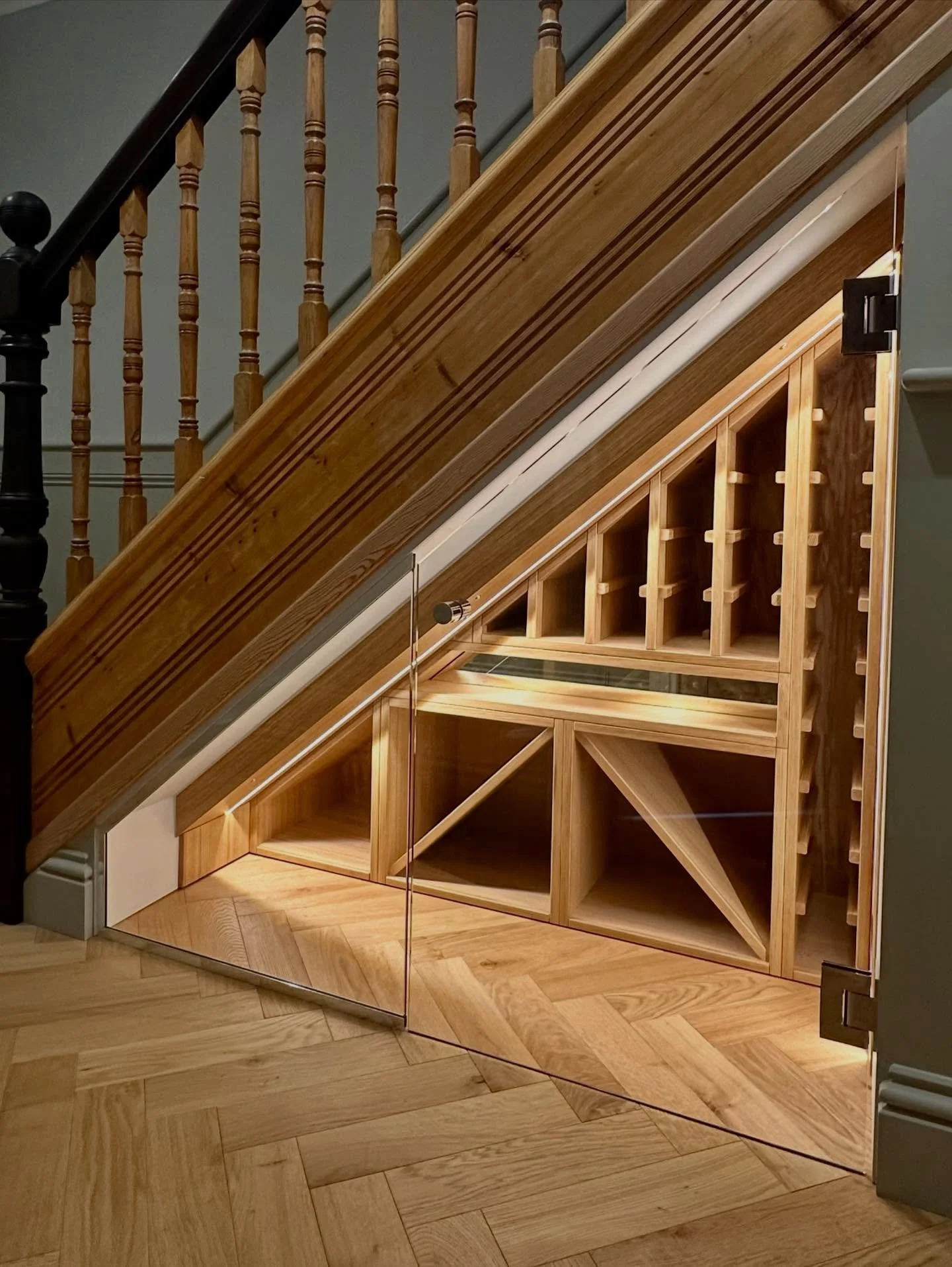 Our latest wine cellar project has been a joy to be part of. The new glass doors really finish it off. It was great to collaborate with their interior design team on this project. #bespokecabinetry #winecellars #winecellardesign #understairsstorage #