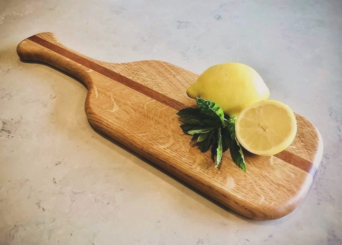 A striking blend of rich hardwoods, precision geometry, and a silky, food-safe finish. Perfectly balanced from handle to tip, this piece is designed to look just as stunning hanging on your wall as it does loaded with a charcuterie spread.
Looking fo