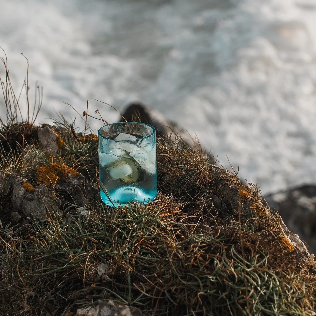 Dark skies, wild seas, and a glass of Lantic - perfectly served. 🌿